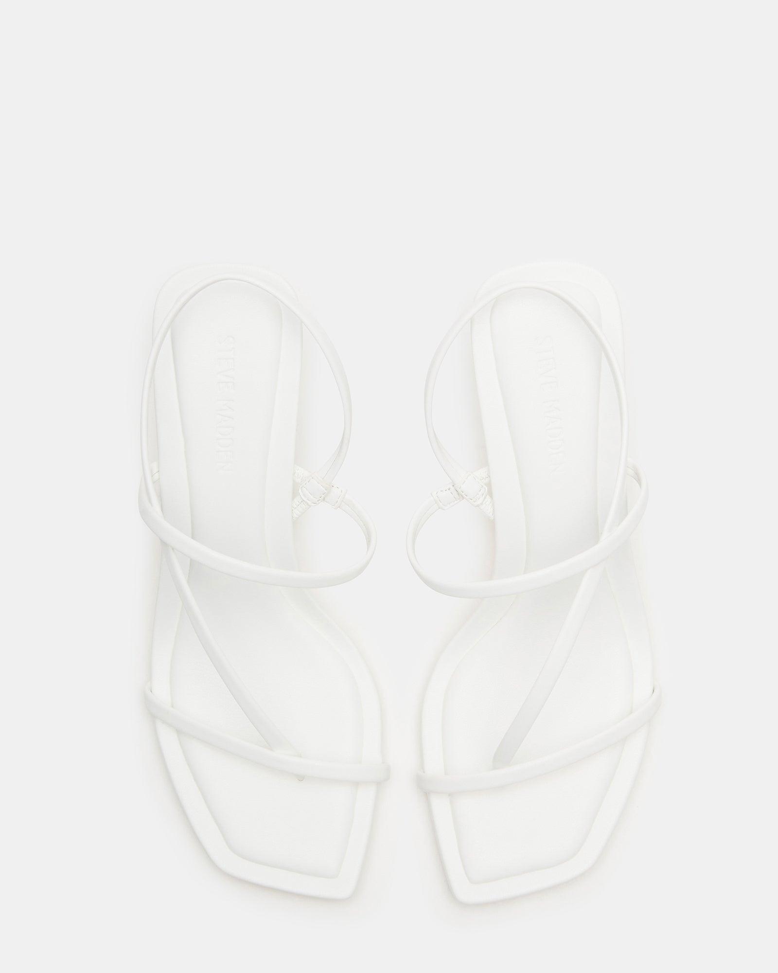 Close-up of ankle straps and vegan leather texture