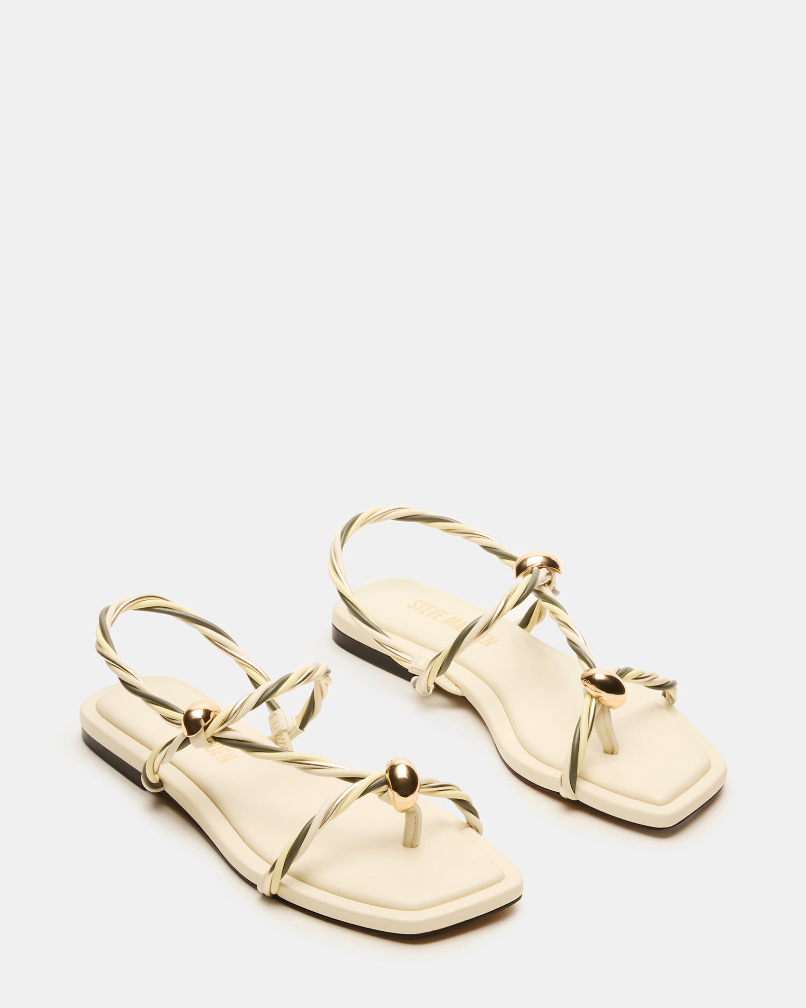 Fashionable womens vegan leather platform sandals worn with summer attire