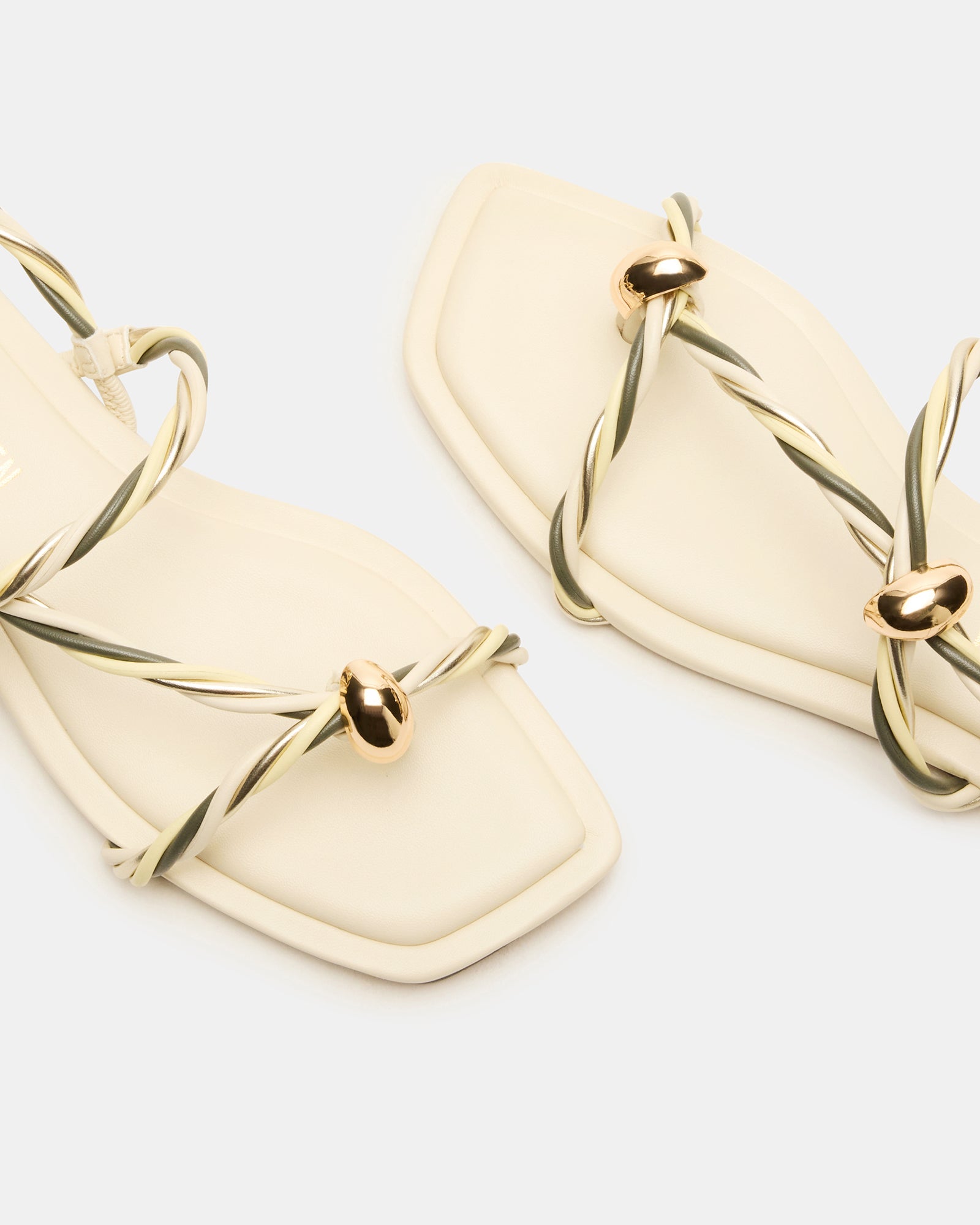 Side view of LOCO BONE multi vegan leather platform sandals highlighting the square-toe design