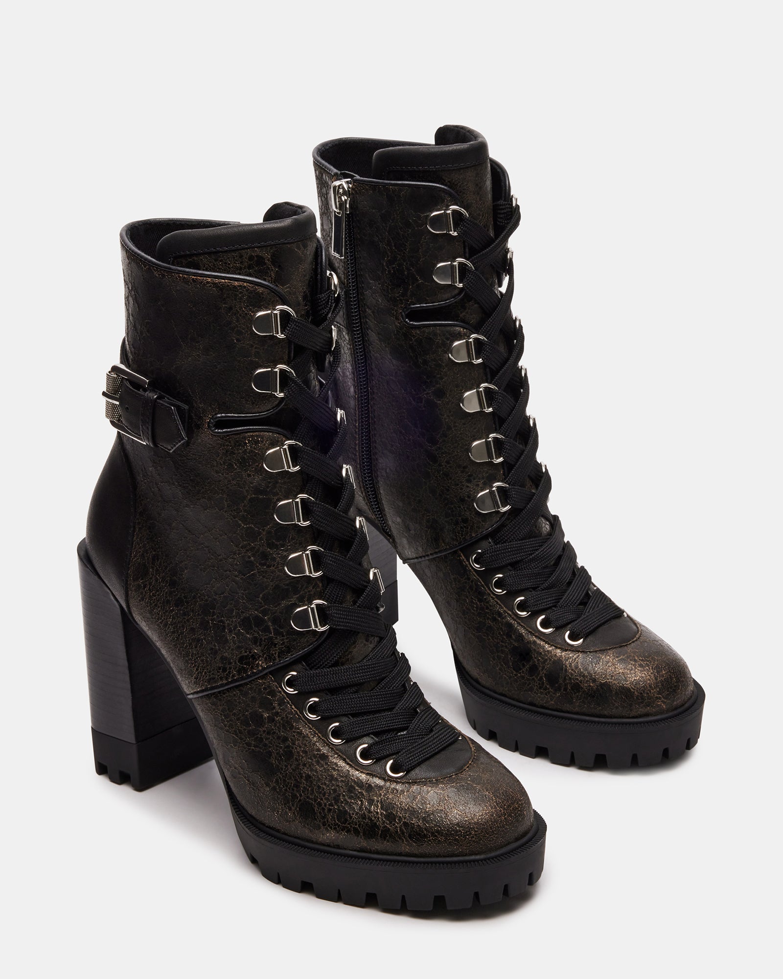 Side profile showing shaft height of black ankle boots