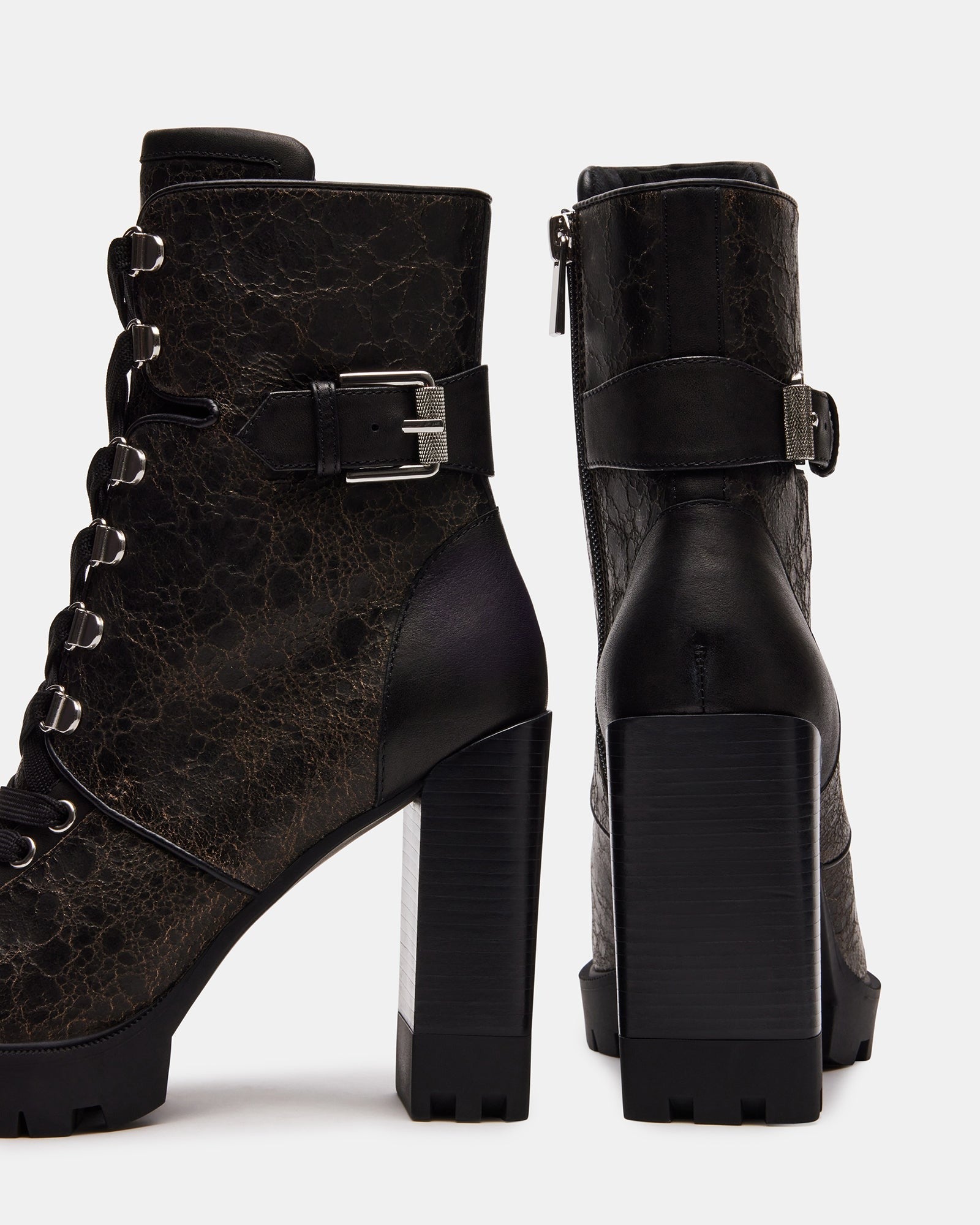 Rear view of boots leather ankle with textured block heel detail