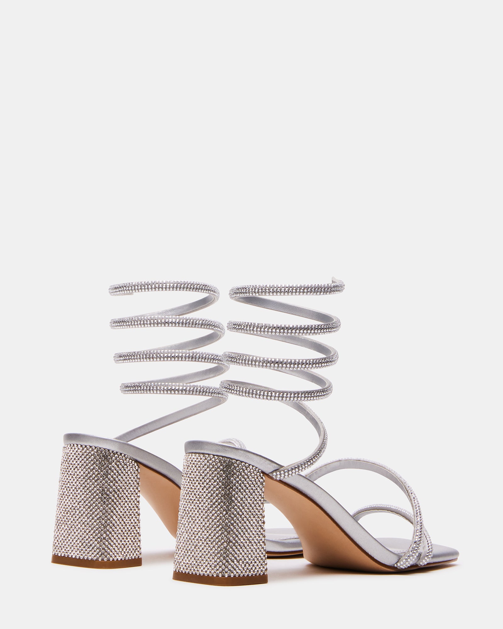 Side view of the gold block heel sandals, highlighting the square toe design.