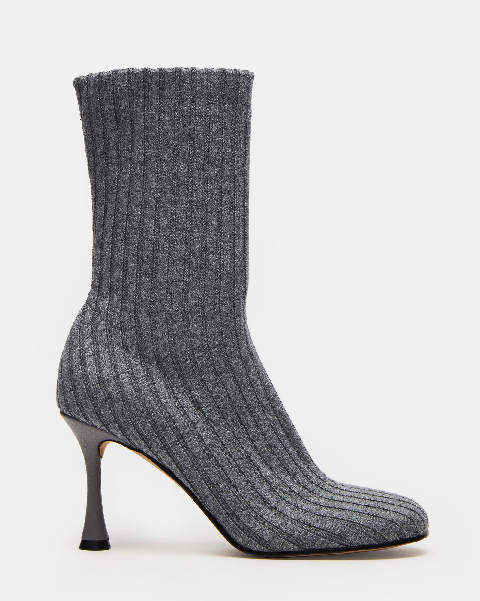 Side view of heeled booties showing textured knit and soft curve around ankle