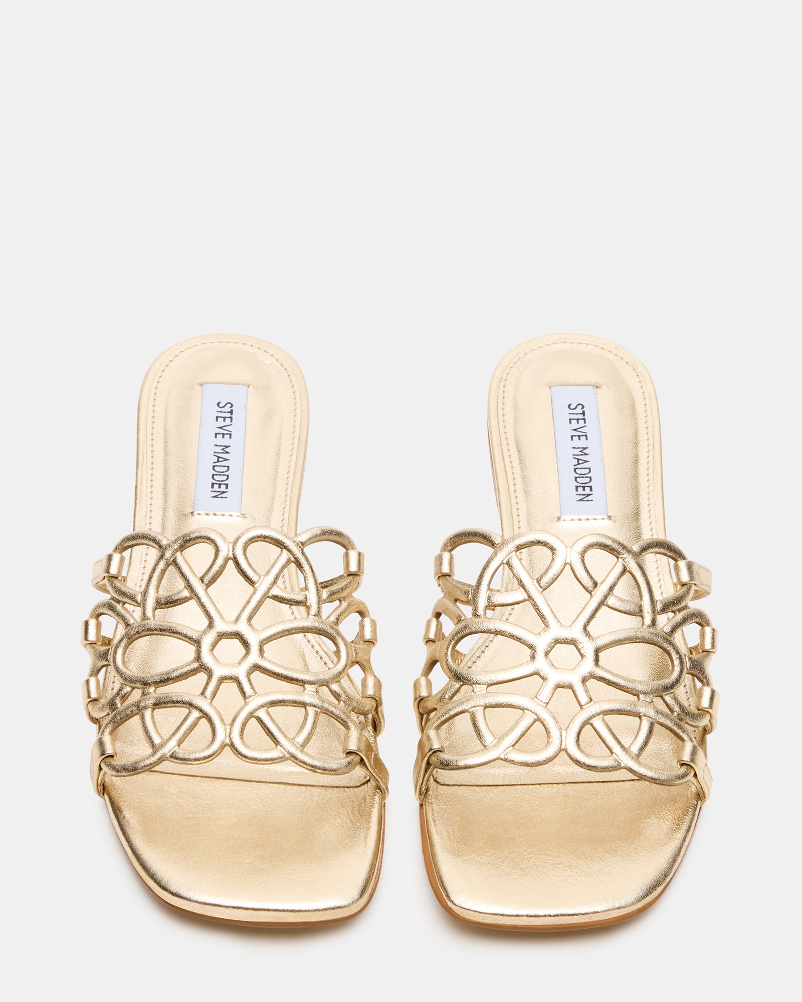 Lotus Gold leather slide sandals shown in sunlight with minimalist background