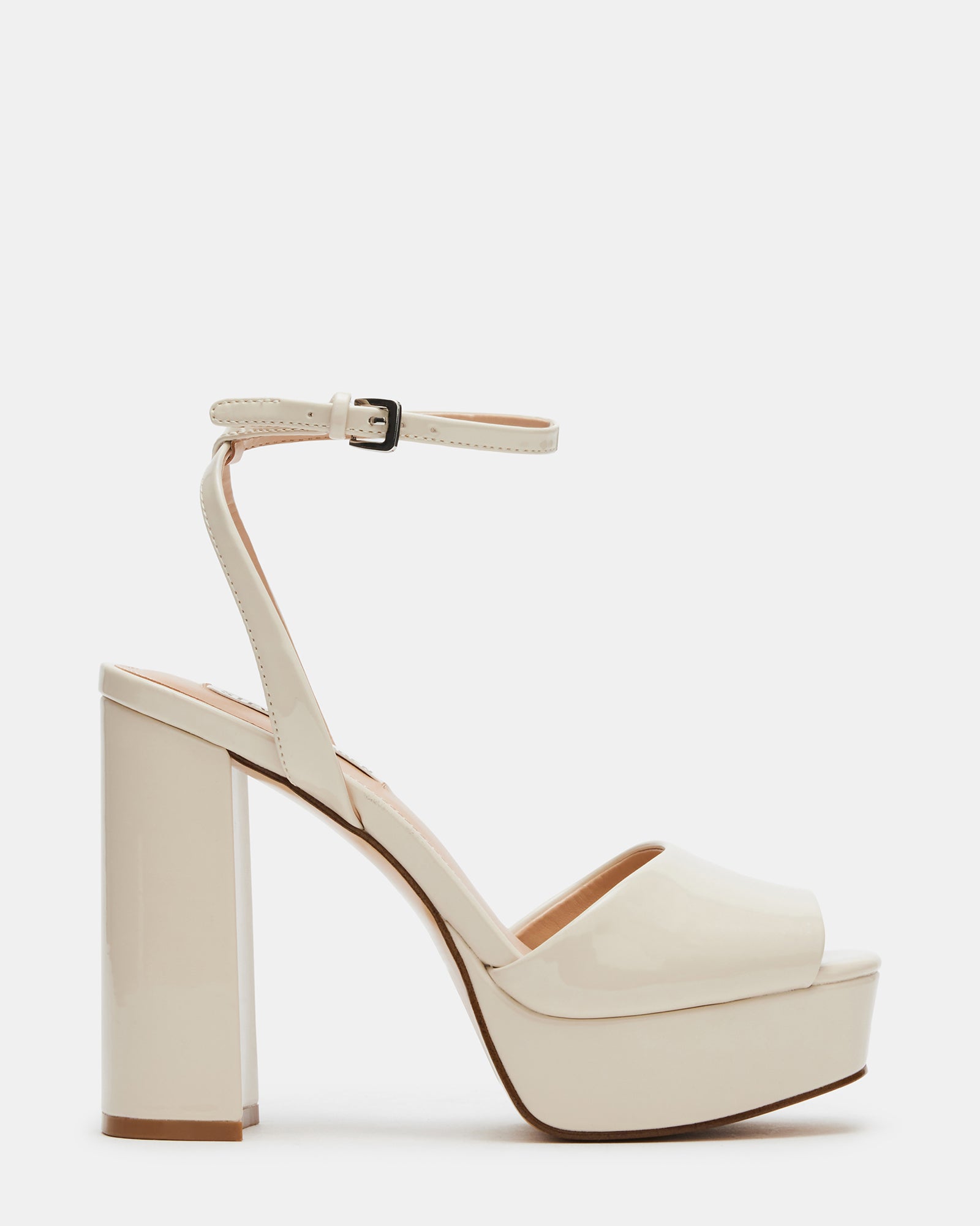 Side view of block heel sandal showing platform height and bone patent shine.