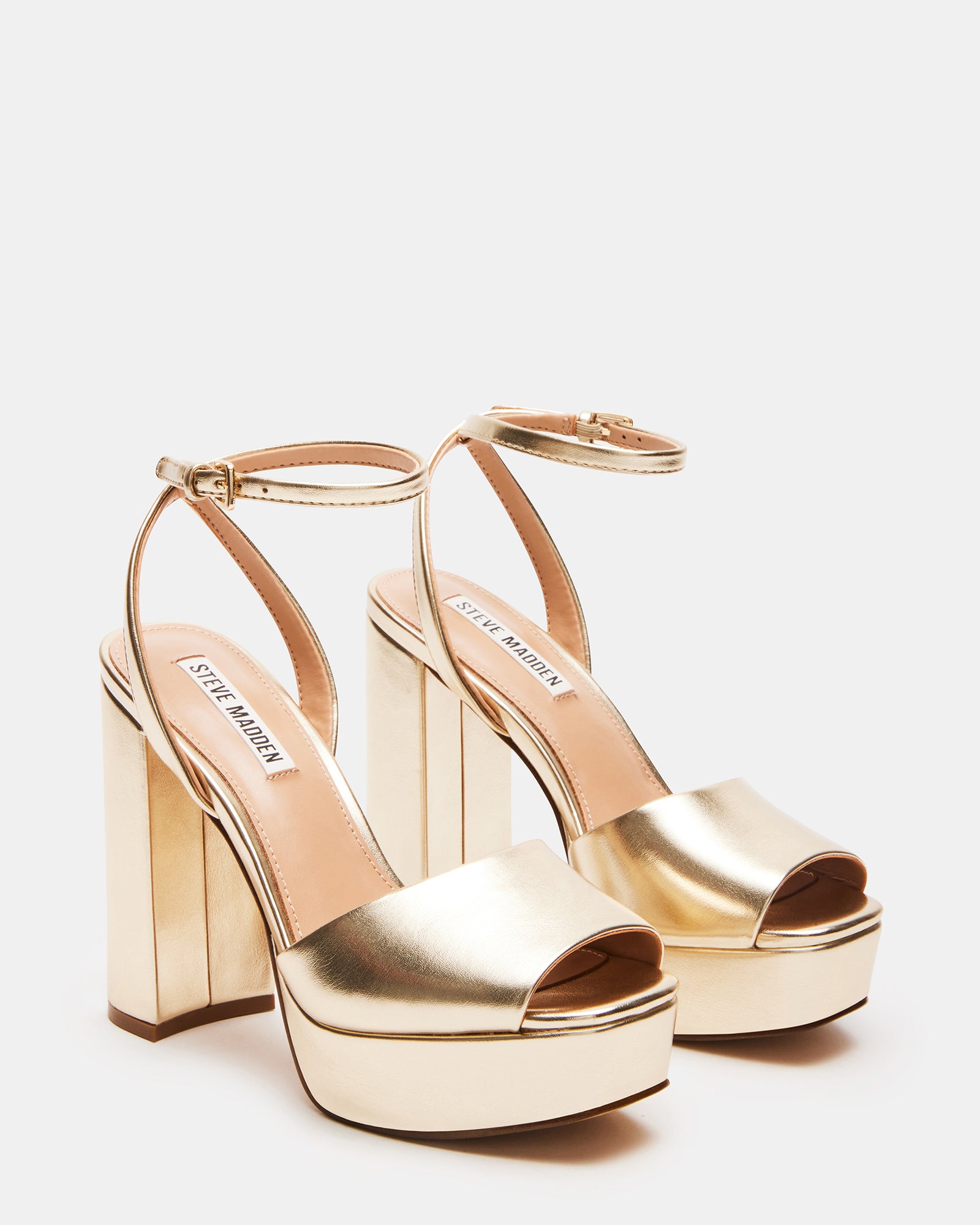 Lourdes sandals showcased with a beautiful evening dress.
