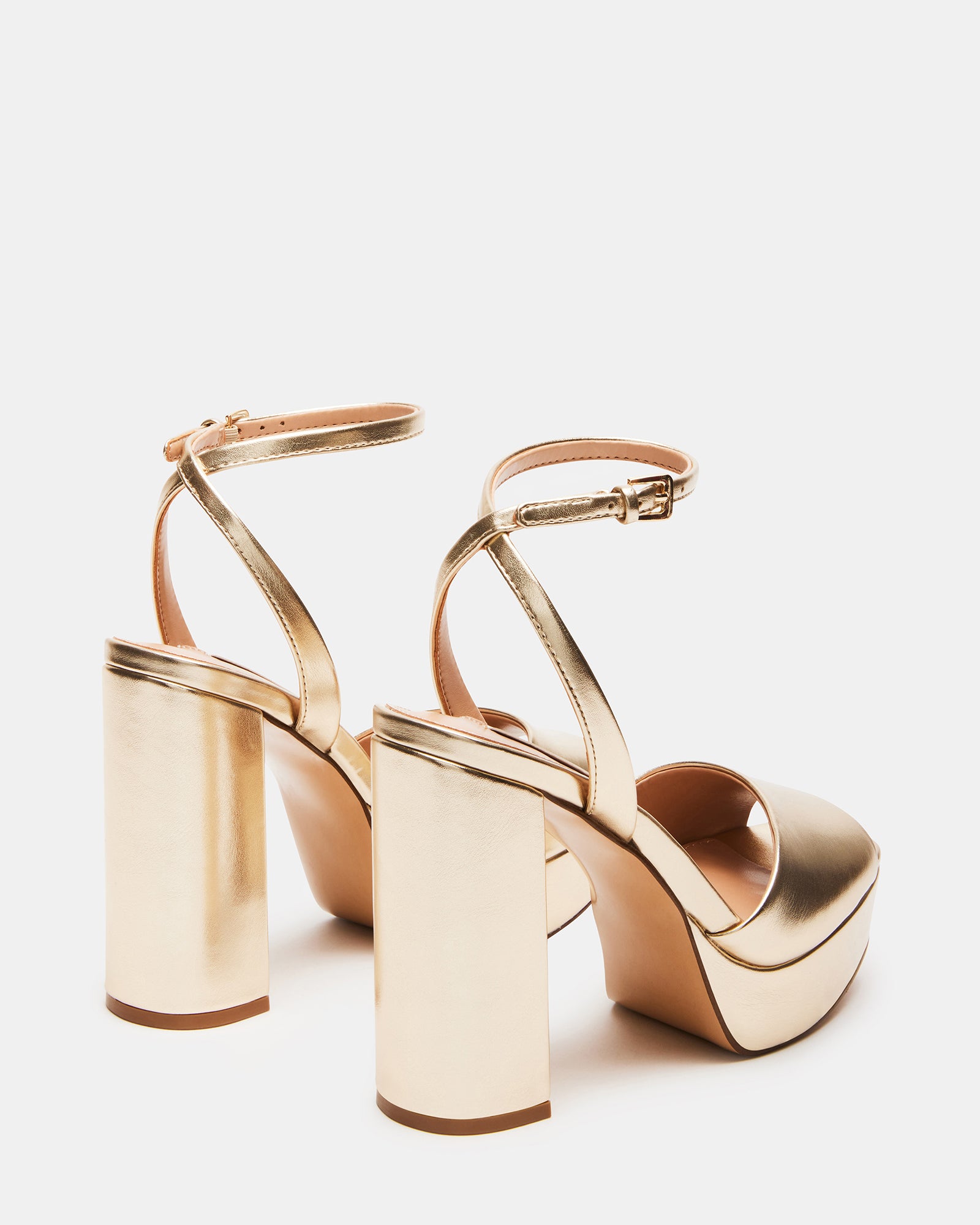Lourdes sandals showcased with a beautiful evening dress.