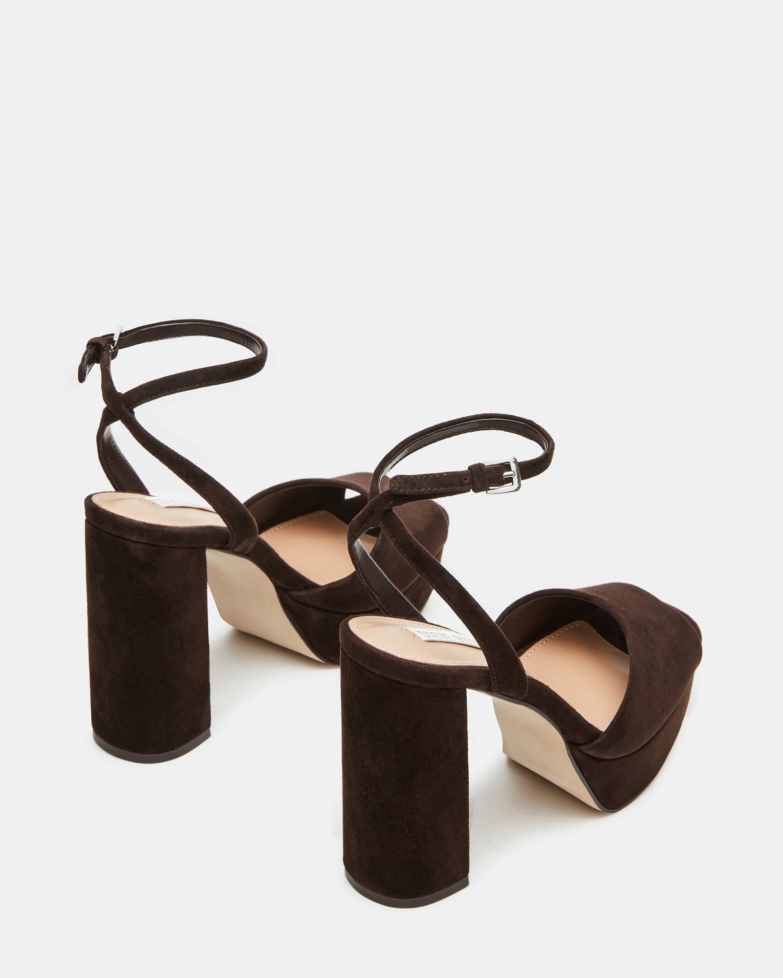 Close-up of the soft suede texture of the block heel sandals.