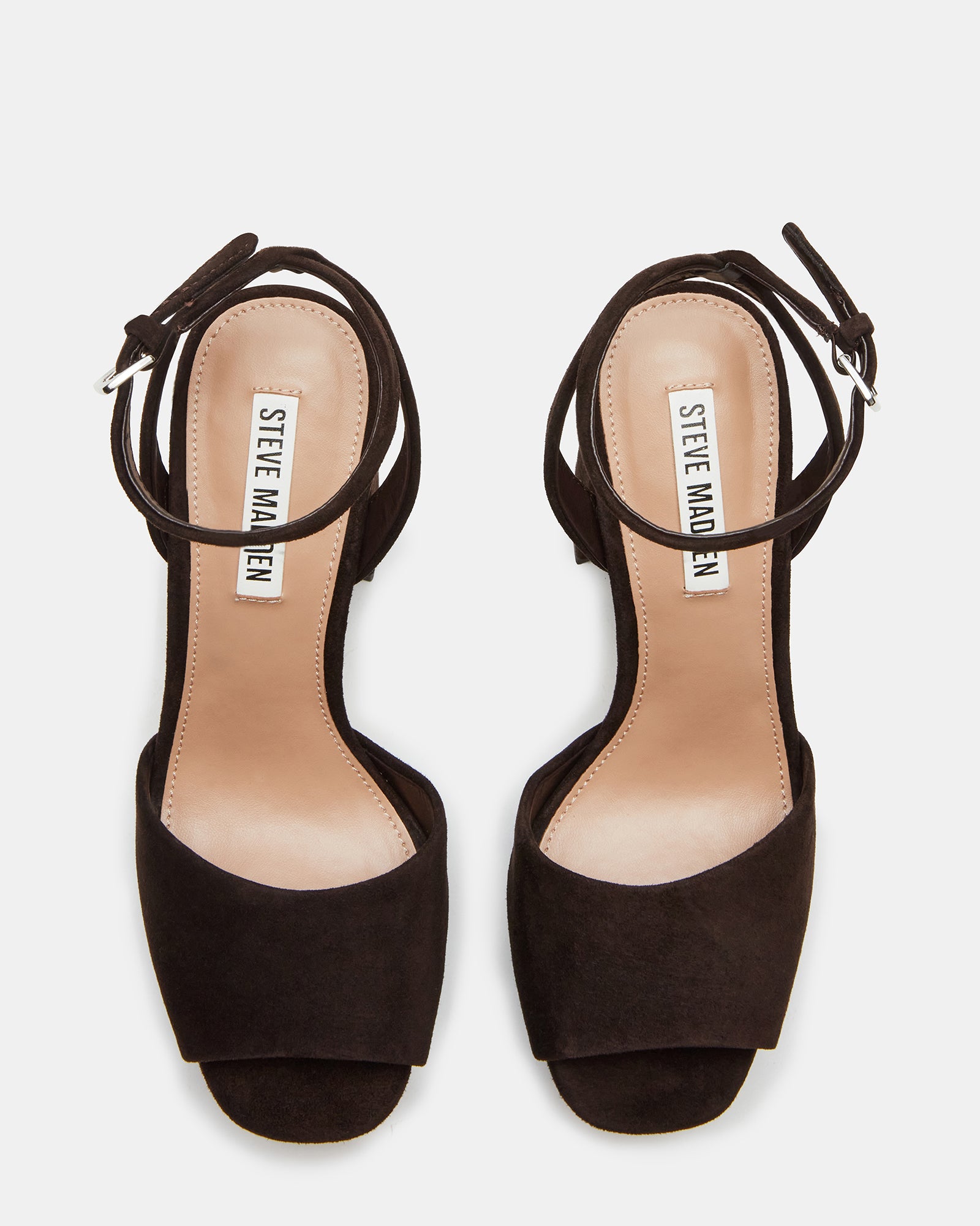 Front view showcasing crossed ankle straps of sandals.
