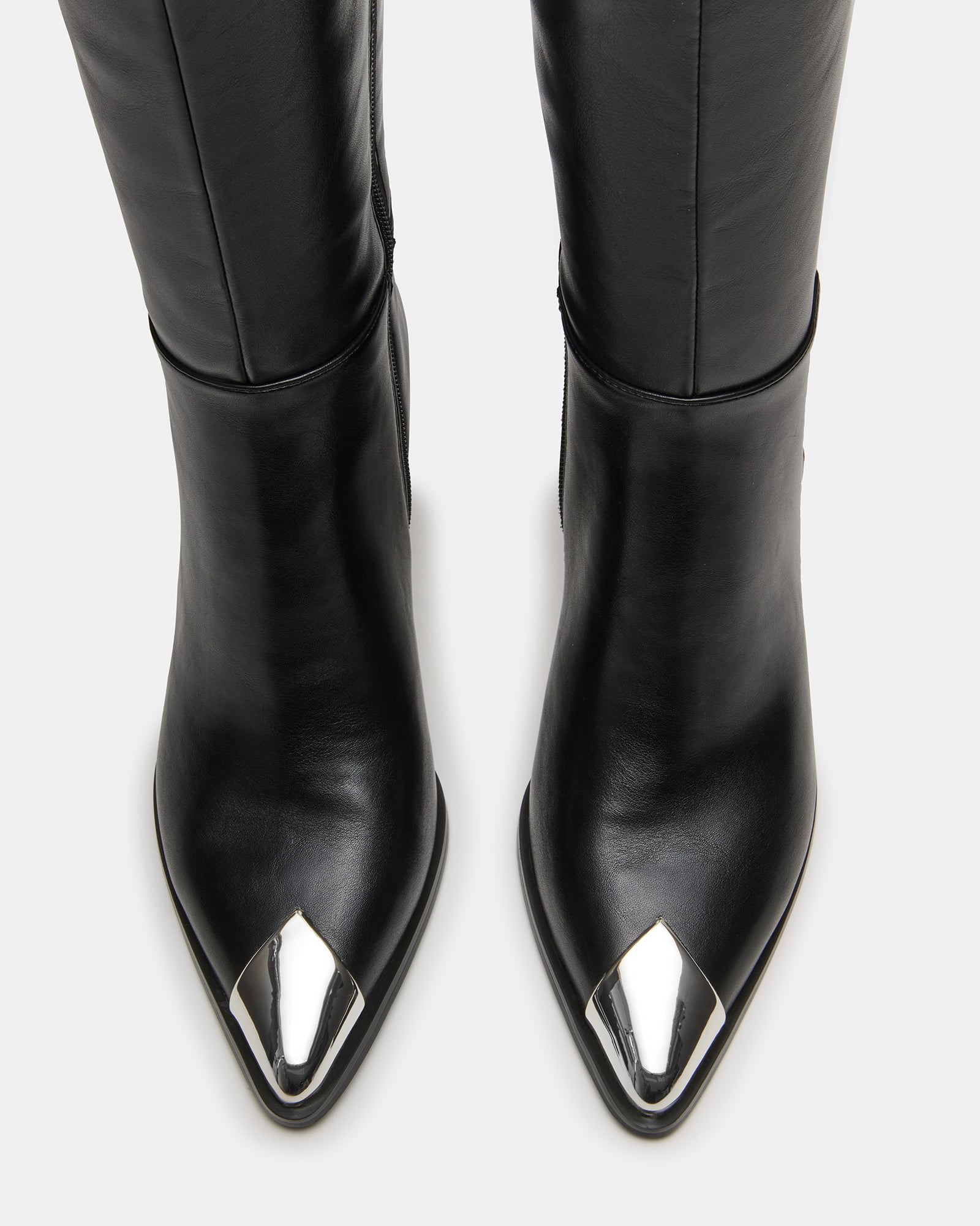 Luciana knee-high boots showcasing silver toe cap detail