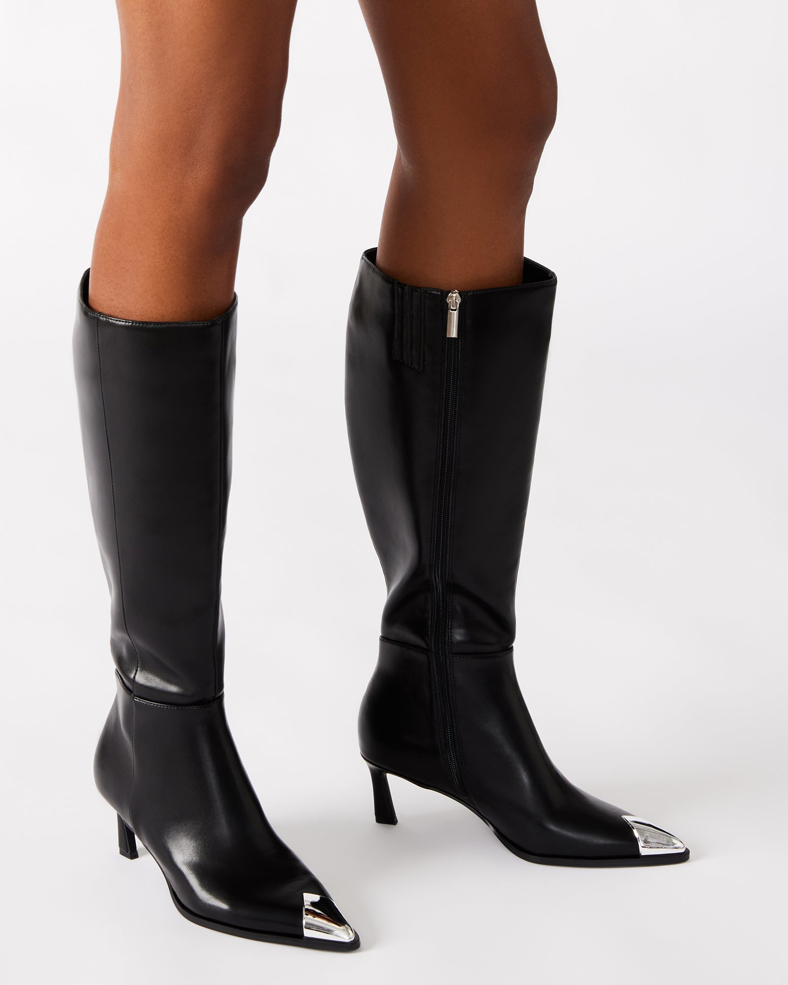 Luciana knee-high boots showcasing silver toe cap detail
