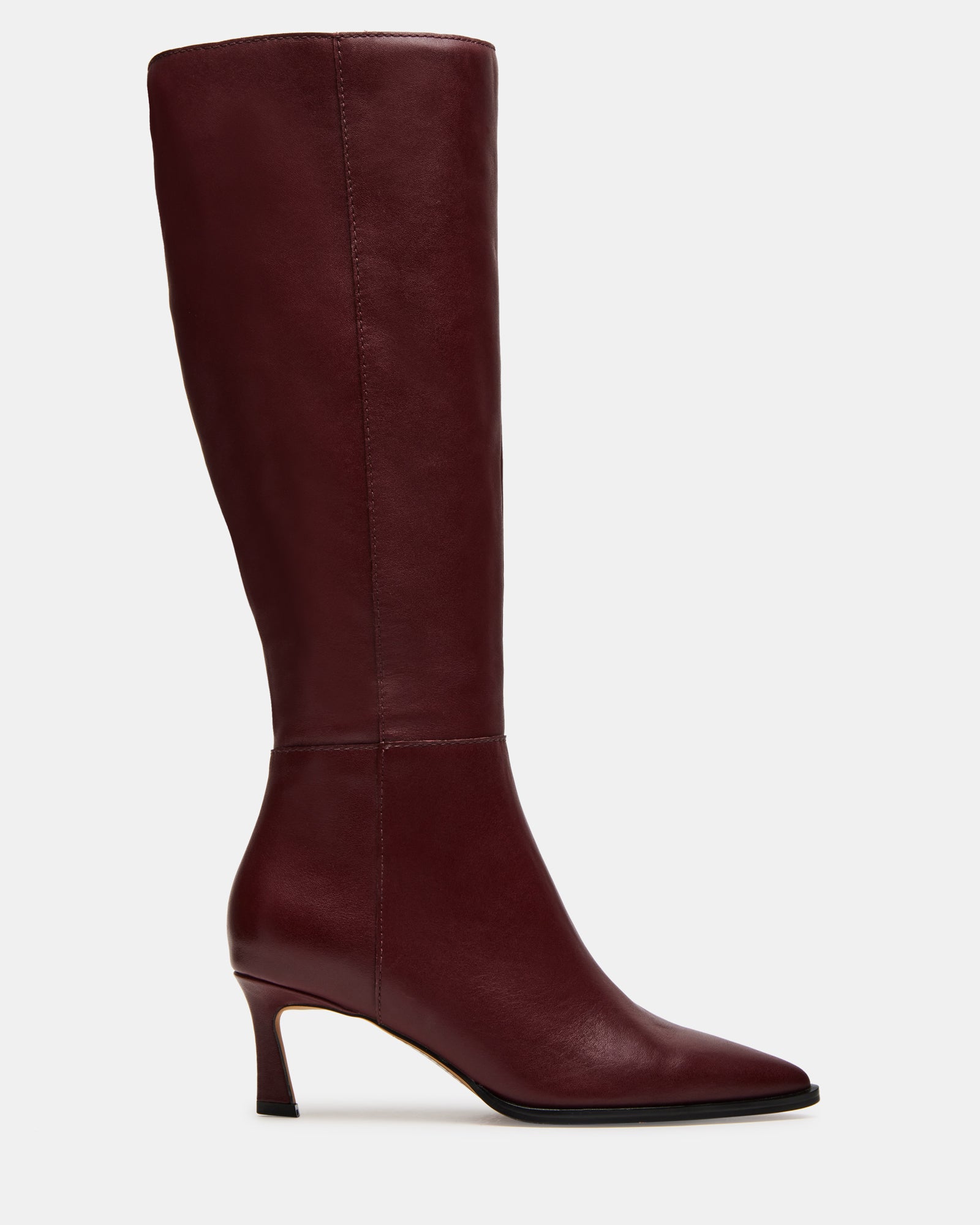 Close-up of burgundy knee-high boots with pointed toe and kitten heel