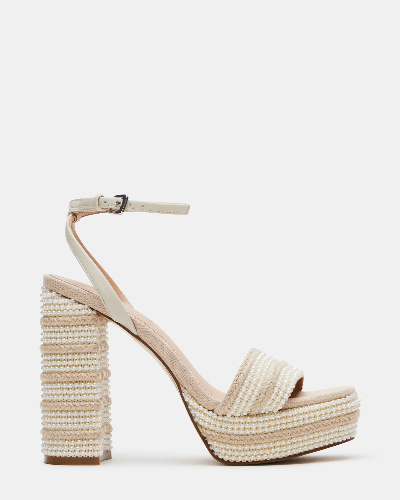 Close-up of raffia platform heels with pearl details for beach weddings