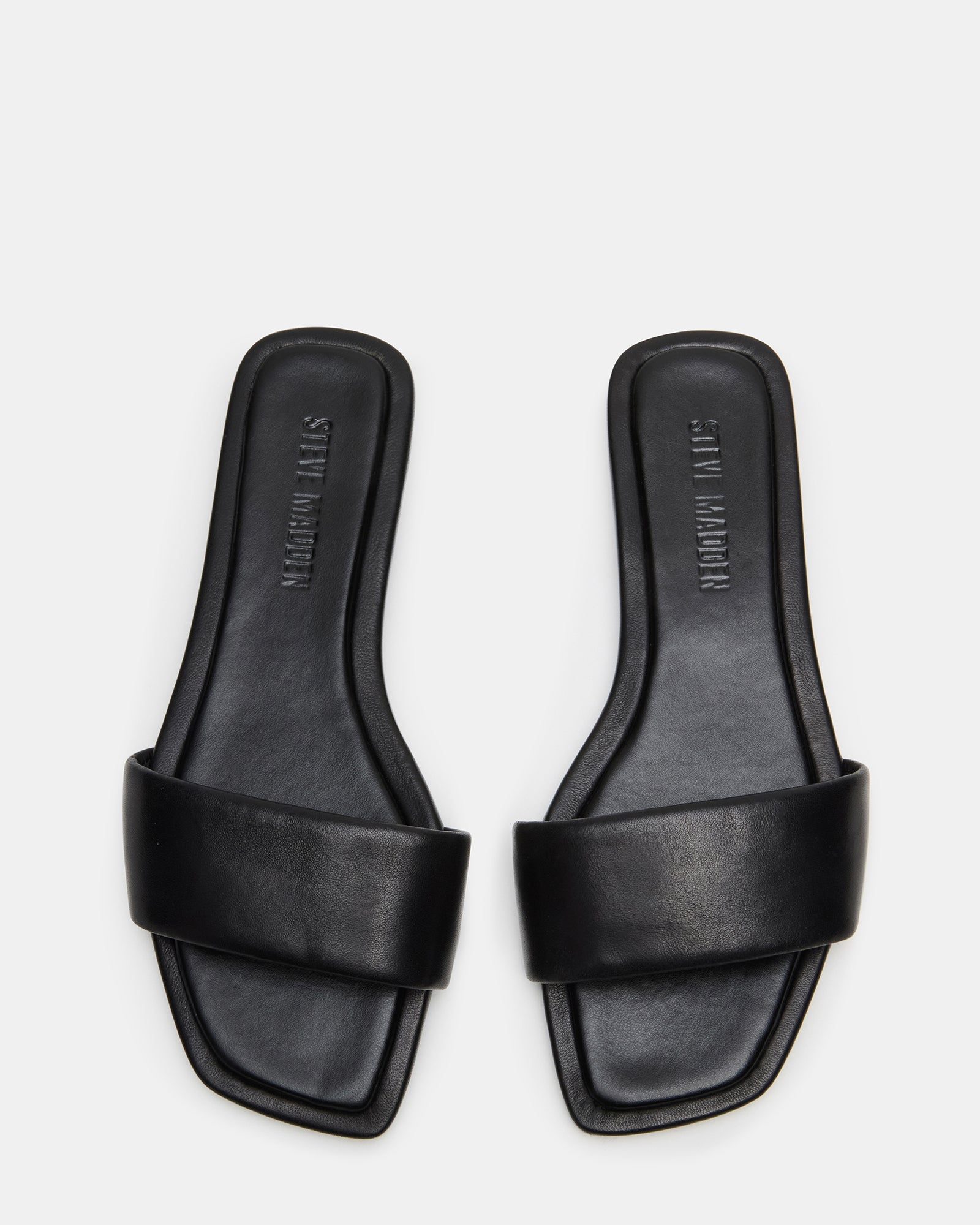 Close-up of the textured leather and stitching details for durability