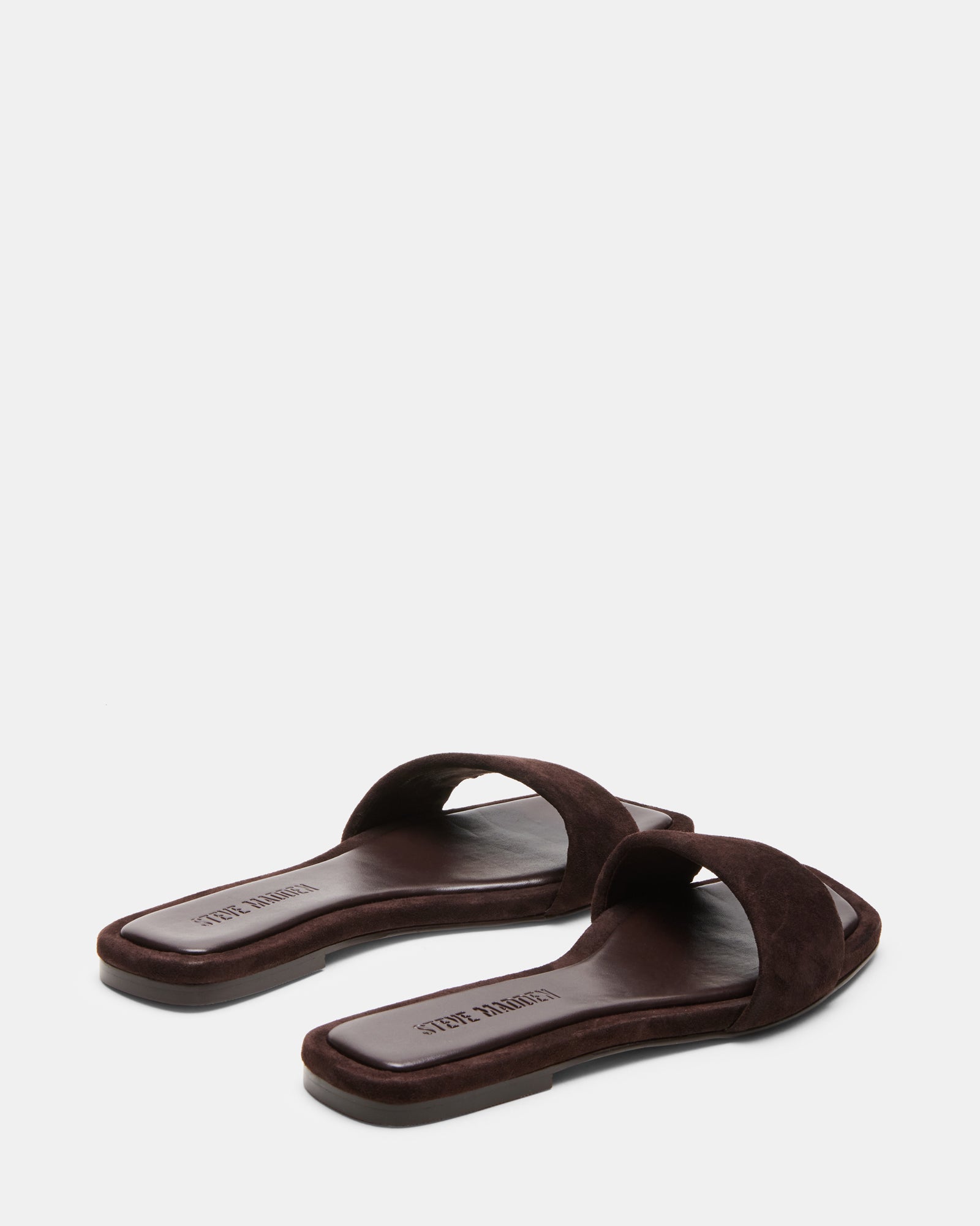 LUMINA flat sandals worn at a summer event.