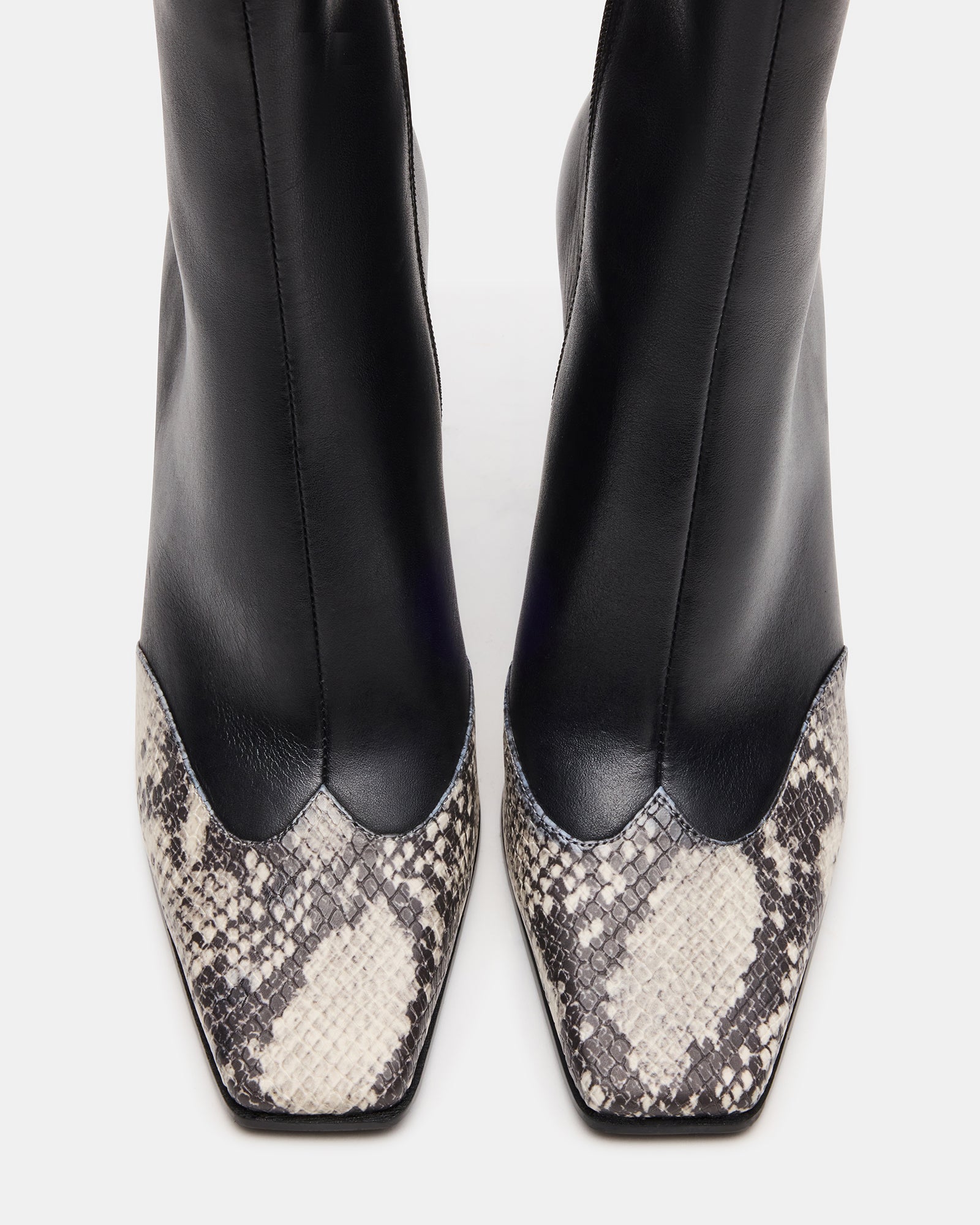 LYLE black ankle boots styled with skinny jeans for a night out.