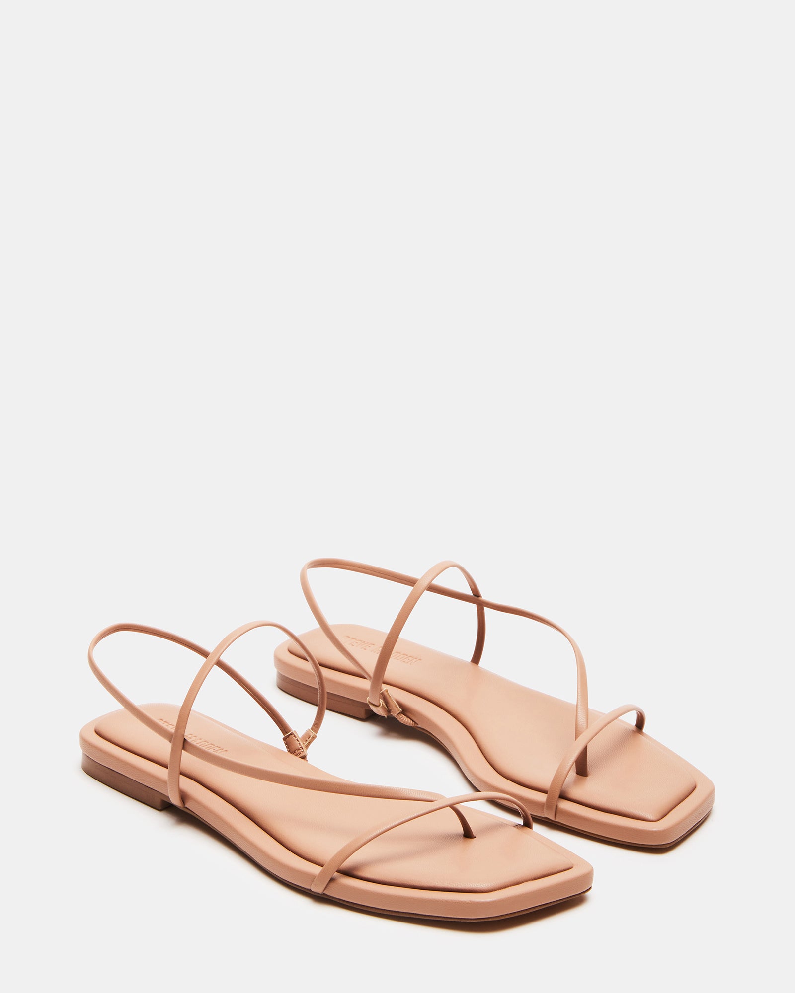Side profile view showing the sleek silhouette of these low heel wedding shoes