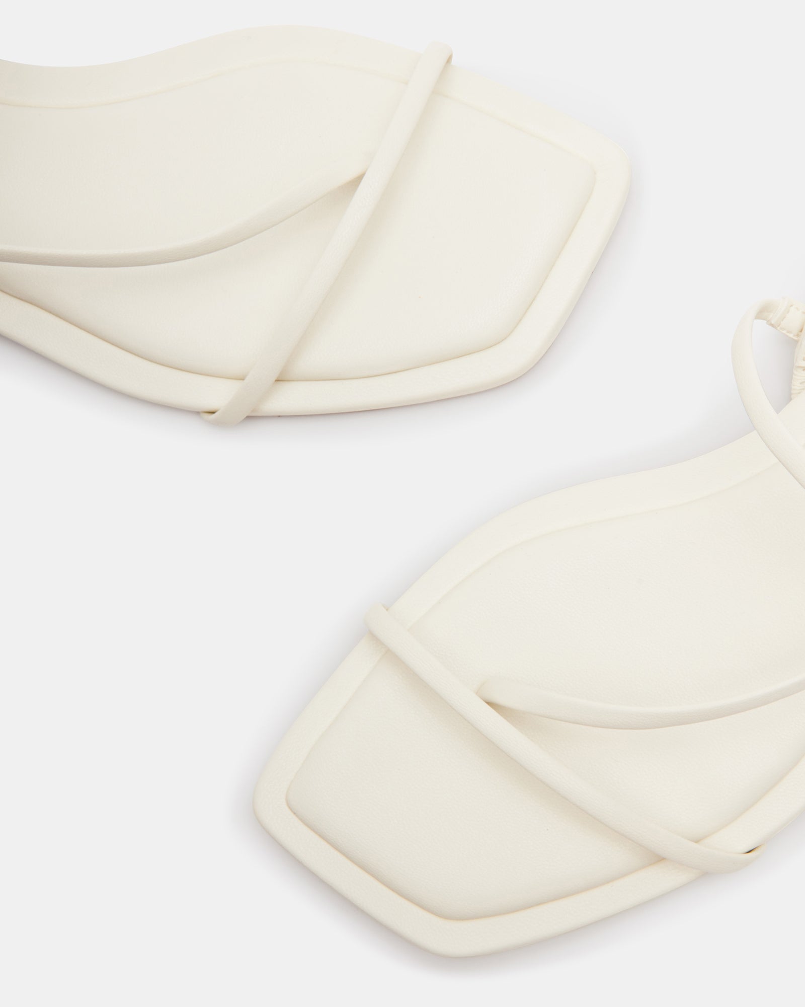 Lynley White vegan shoes showcasing side view and comfort features.