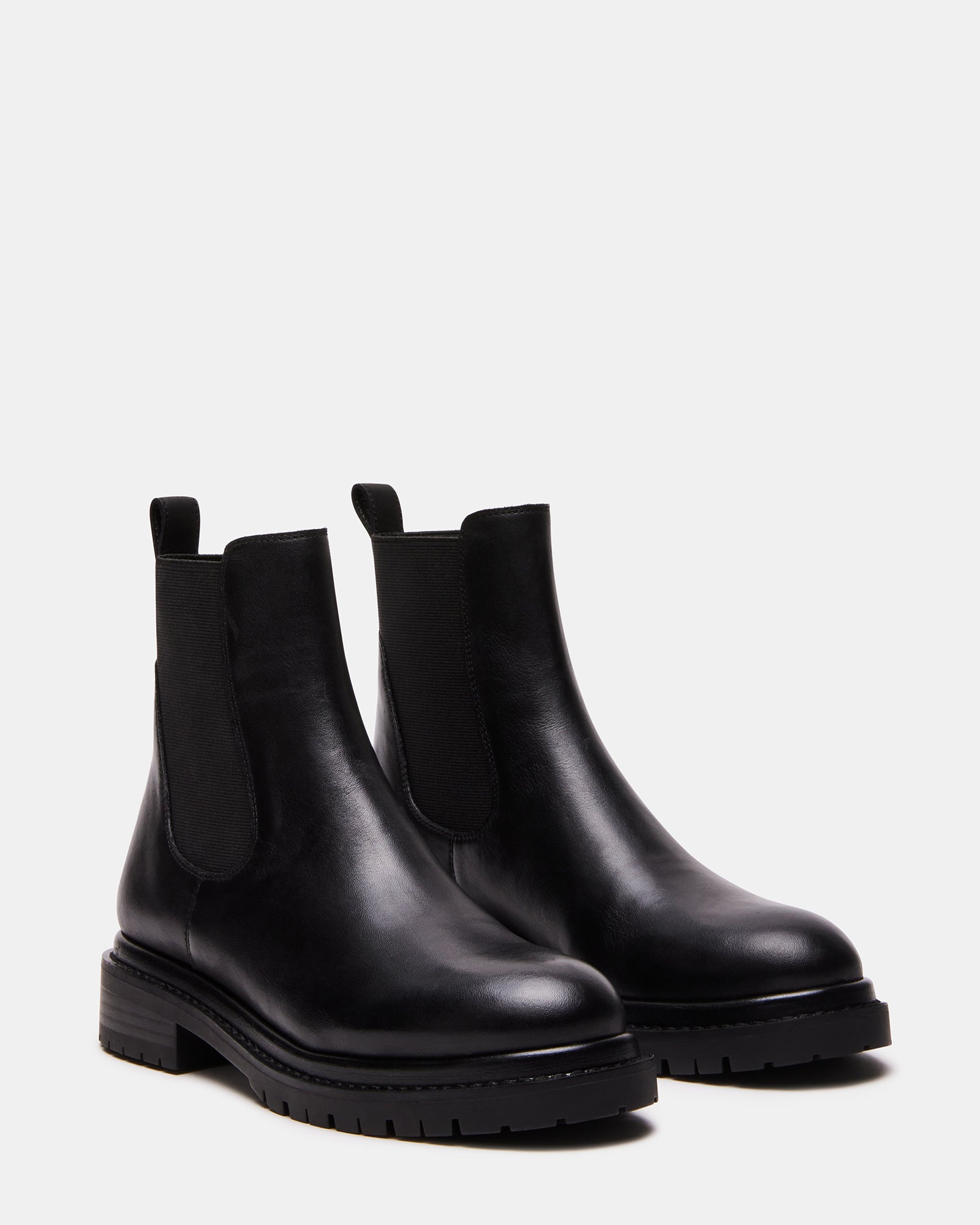 Front view of black leather platform Chelsea boot with textured tread