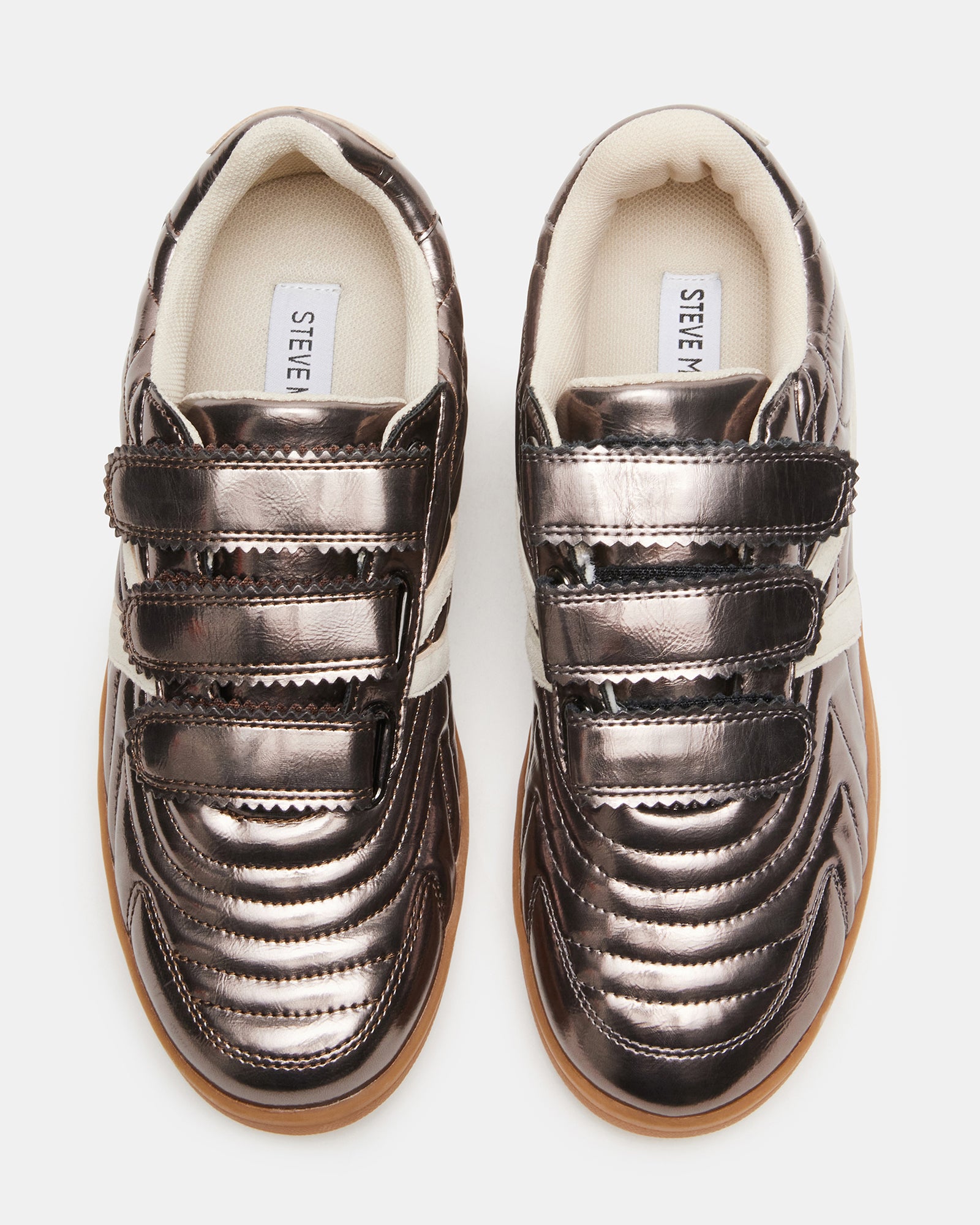 Side view of Macer Pewter sneakers with Velcro straps on a casual outfit