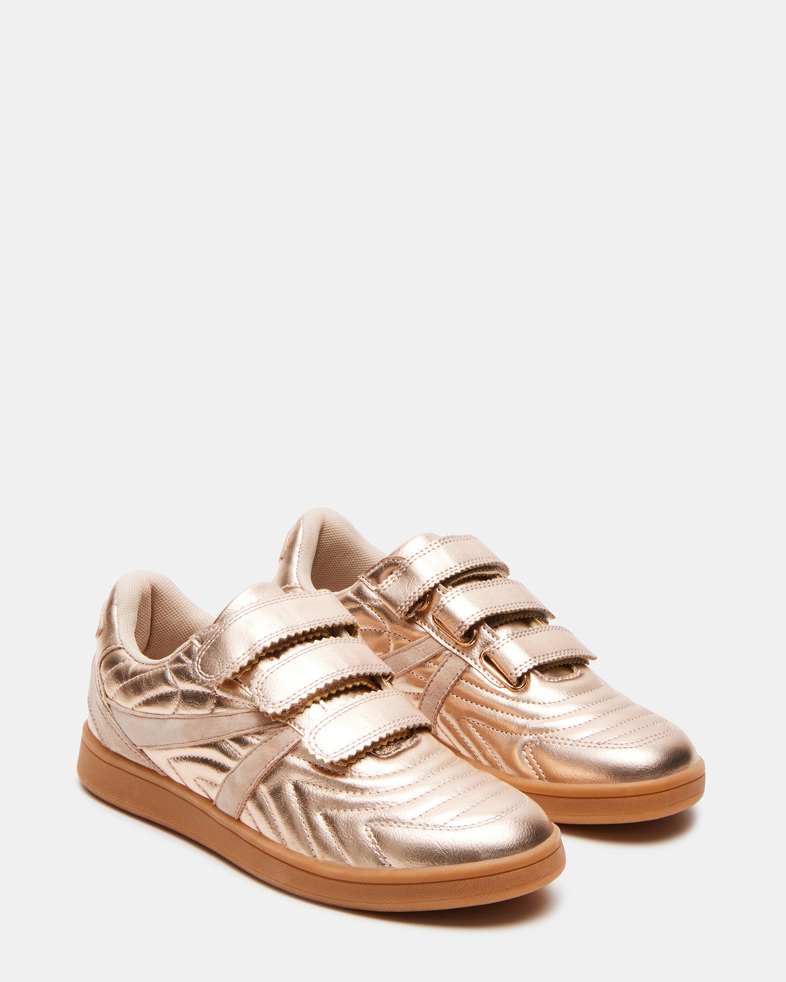 Close-up of the suede material and stylish design of the sneakers.