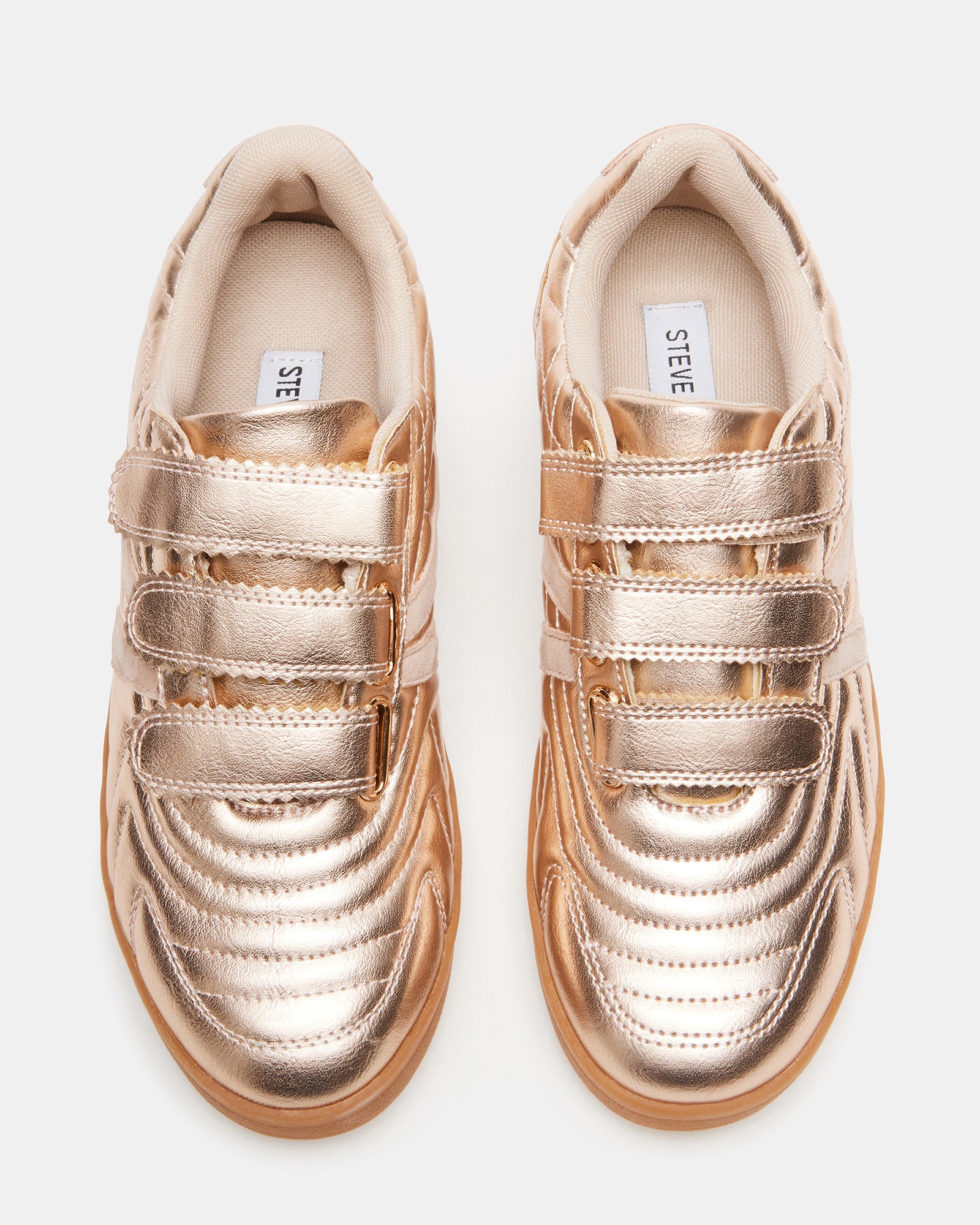Side view of Macer Rose Gold sneakers showcasing Velcro straps.