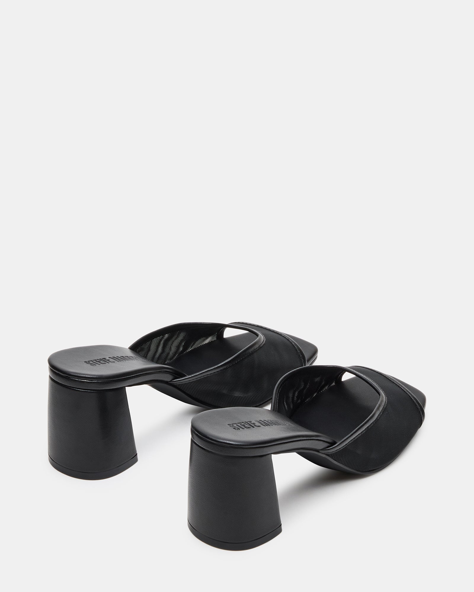Side view showing 3-inch block heel and mesh detailing