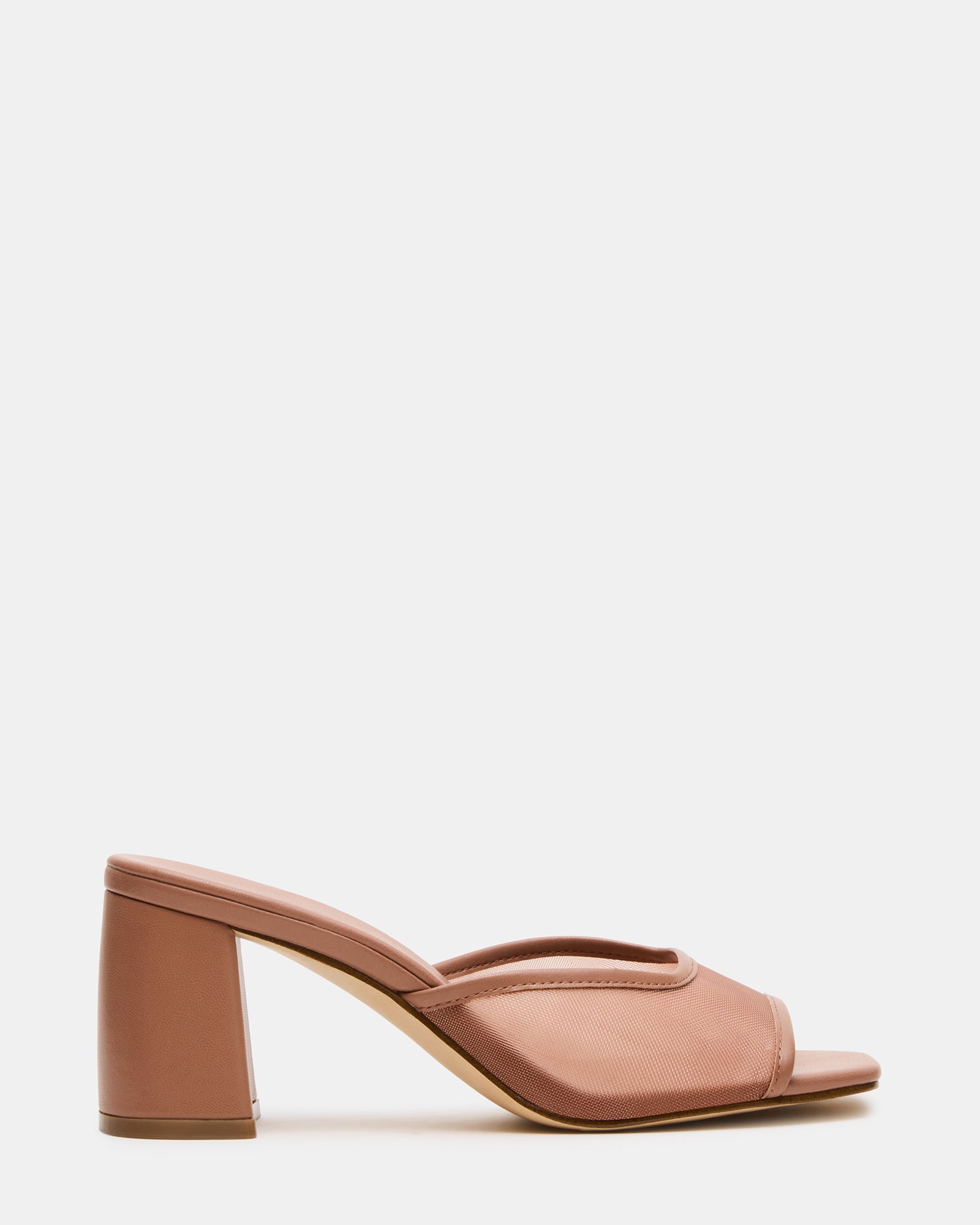 Side profile of square toe high heels styled for urban fashion