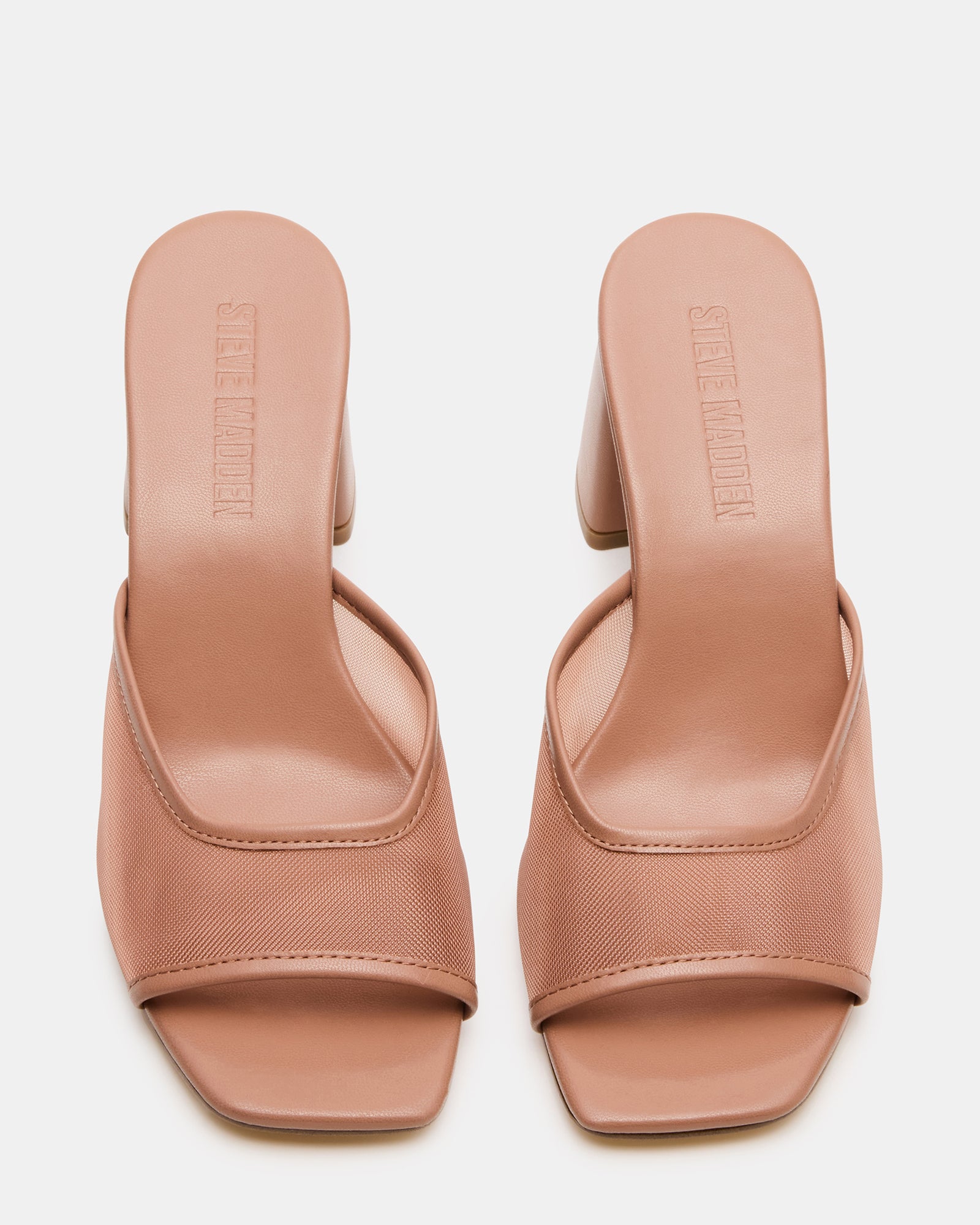 Side profile of square toe high heels styled for urban fashion