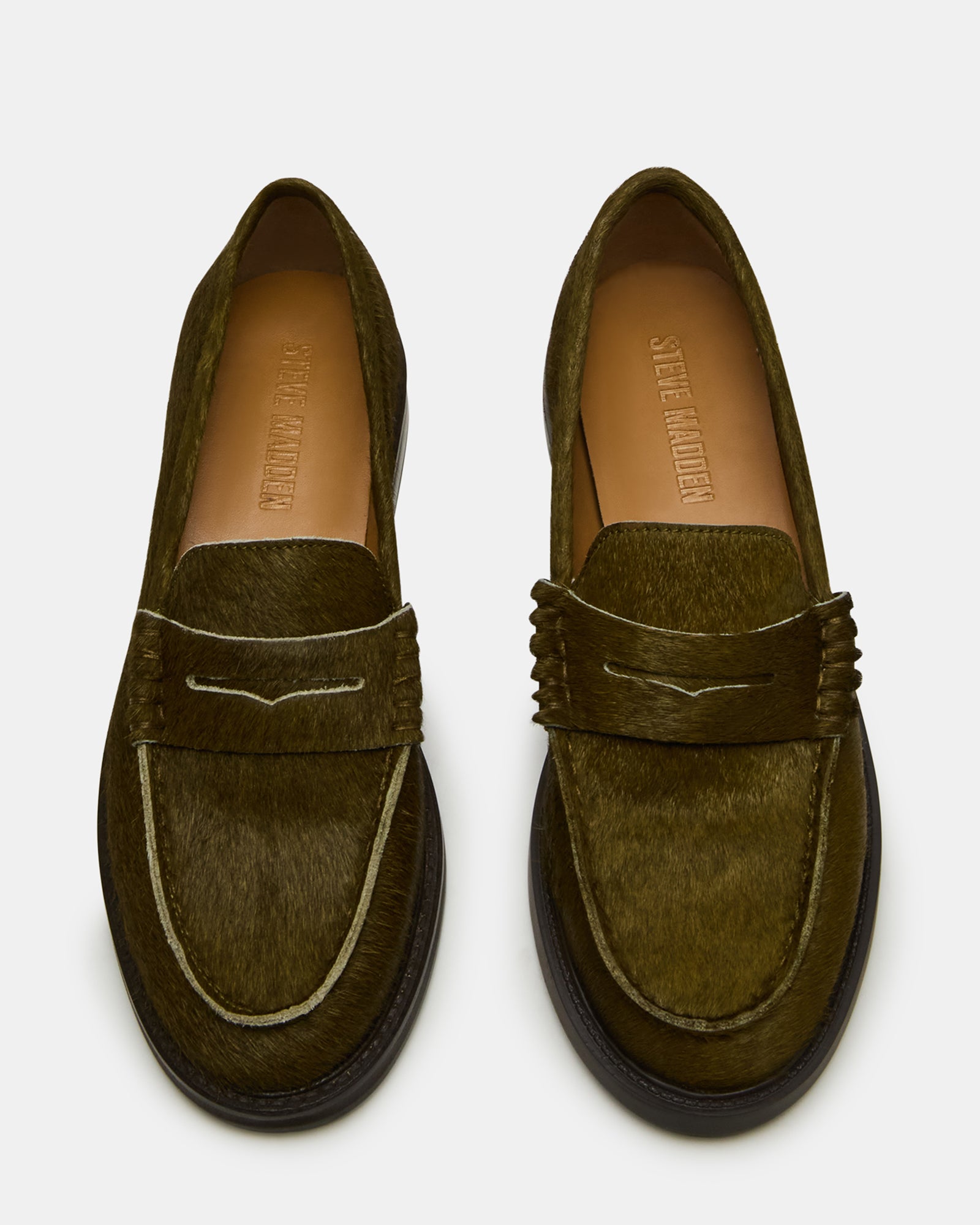 Side view of MADISON OLIVE leather loafers highlighting the sleek leather upper