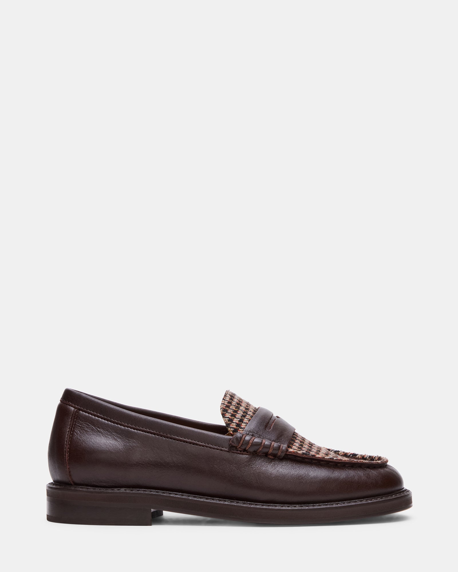 Front view of Madison brown leather loafers for women on a casual outfit