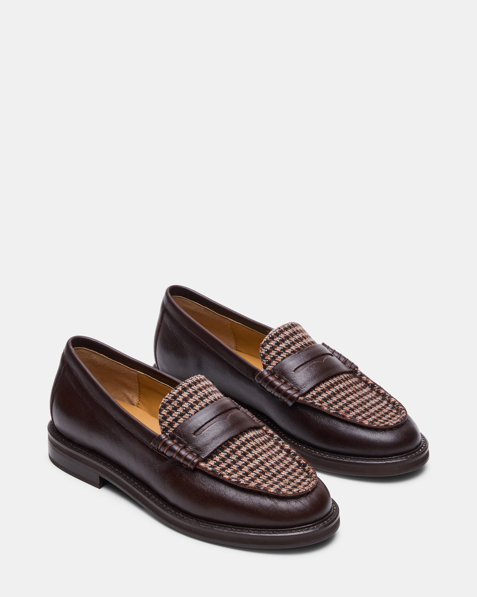 Side angle showcasing the platform loafer design and heel height