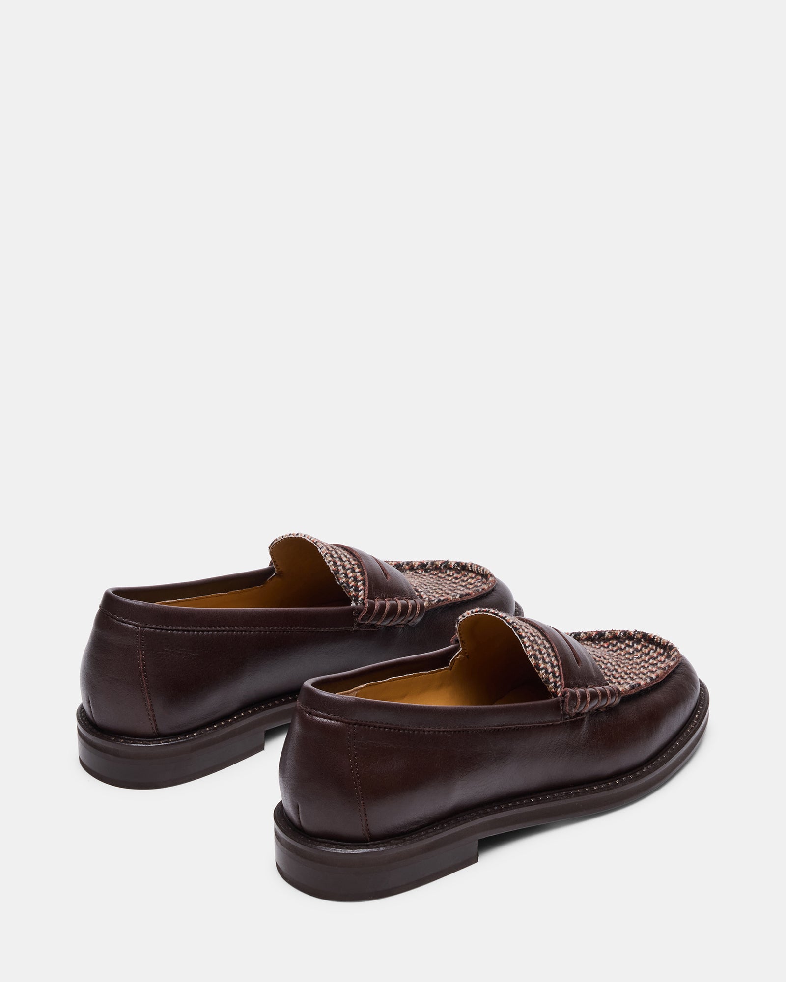 Side angle showcasing the platform loafer design and heel height
