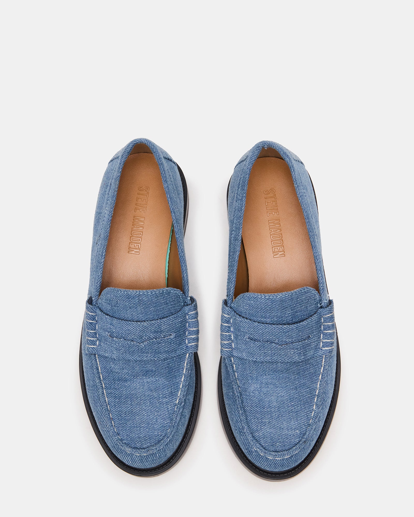 Front view of Madison denim fabric loafers highlighting textile upper and 1-inch heel