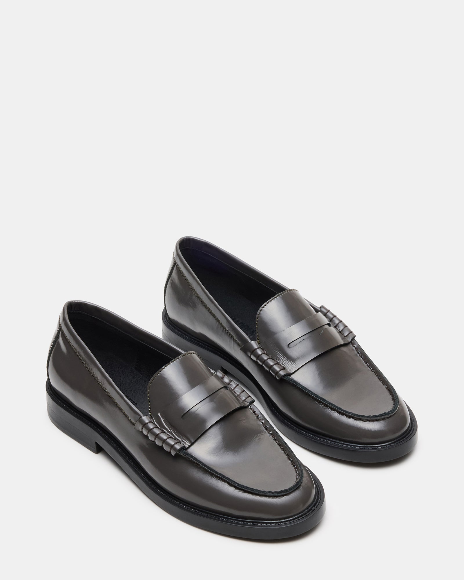 Close-up of the luxurious leather texture of Madison loafers.