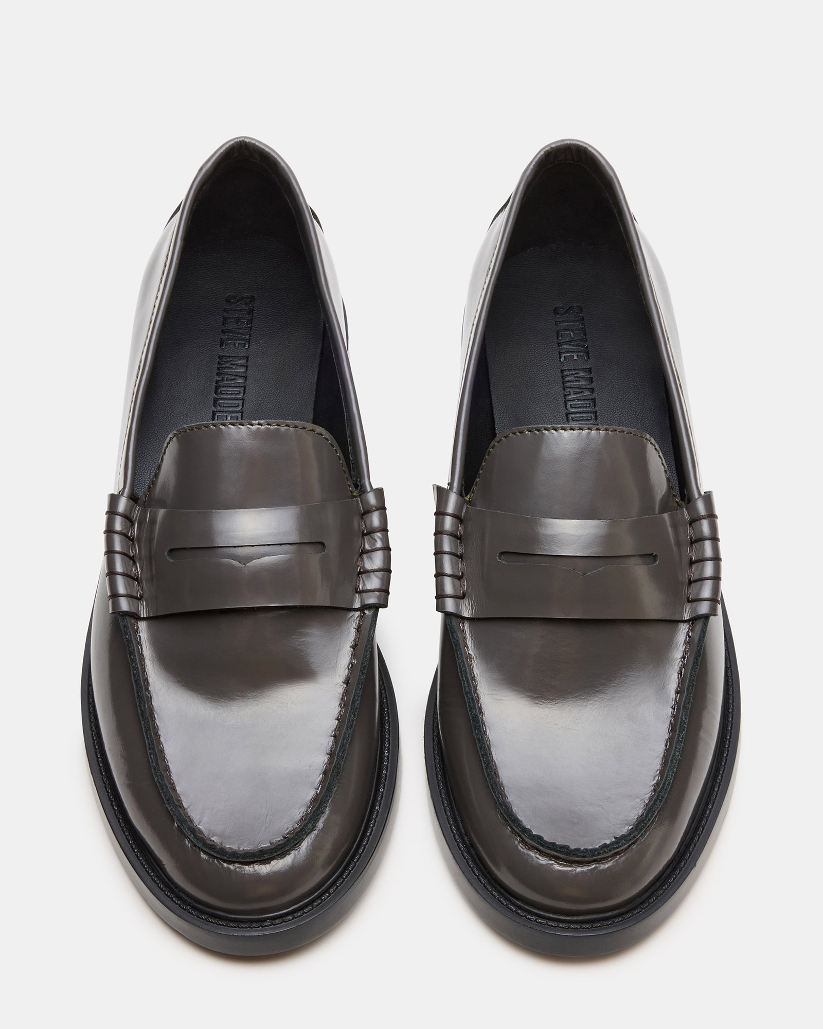 Side view of Madison grey leather loafers showcasing sleek design.