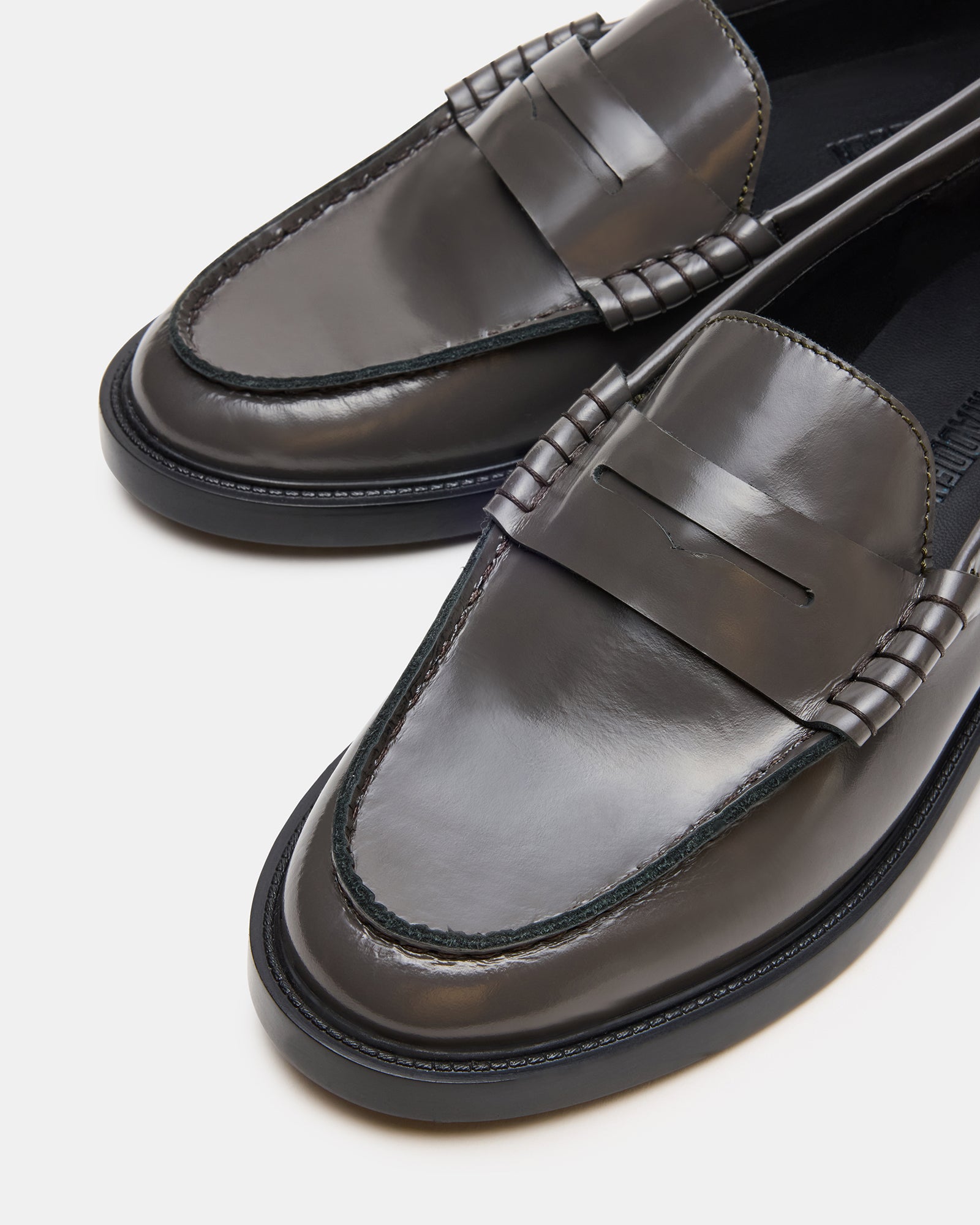 Madison loafers styled with smart casual wear for a polished look.