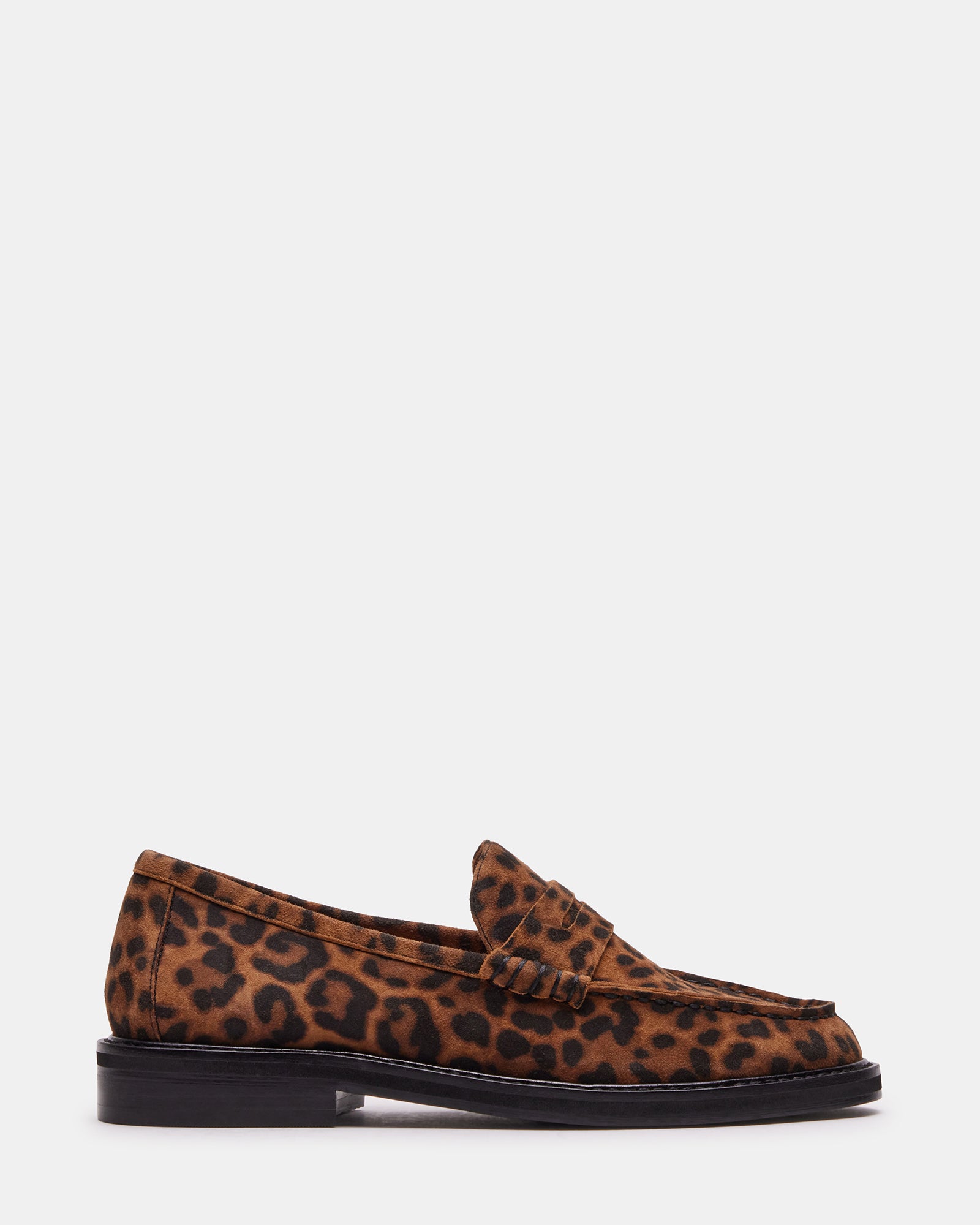 Close-up of men's loafers showing leopard print leather and stitching detail