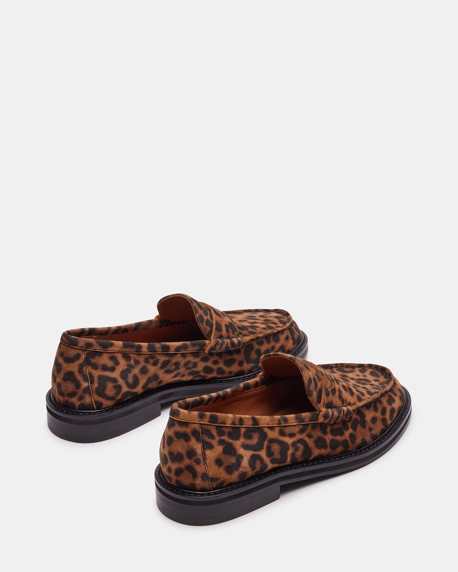 Side angle of Madison loafers styled with slim-fit trousers for office-ready look