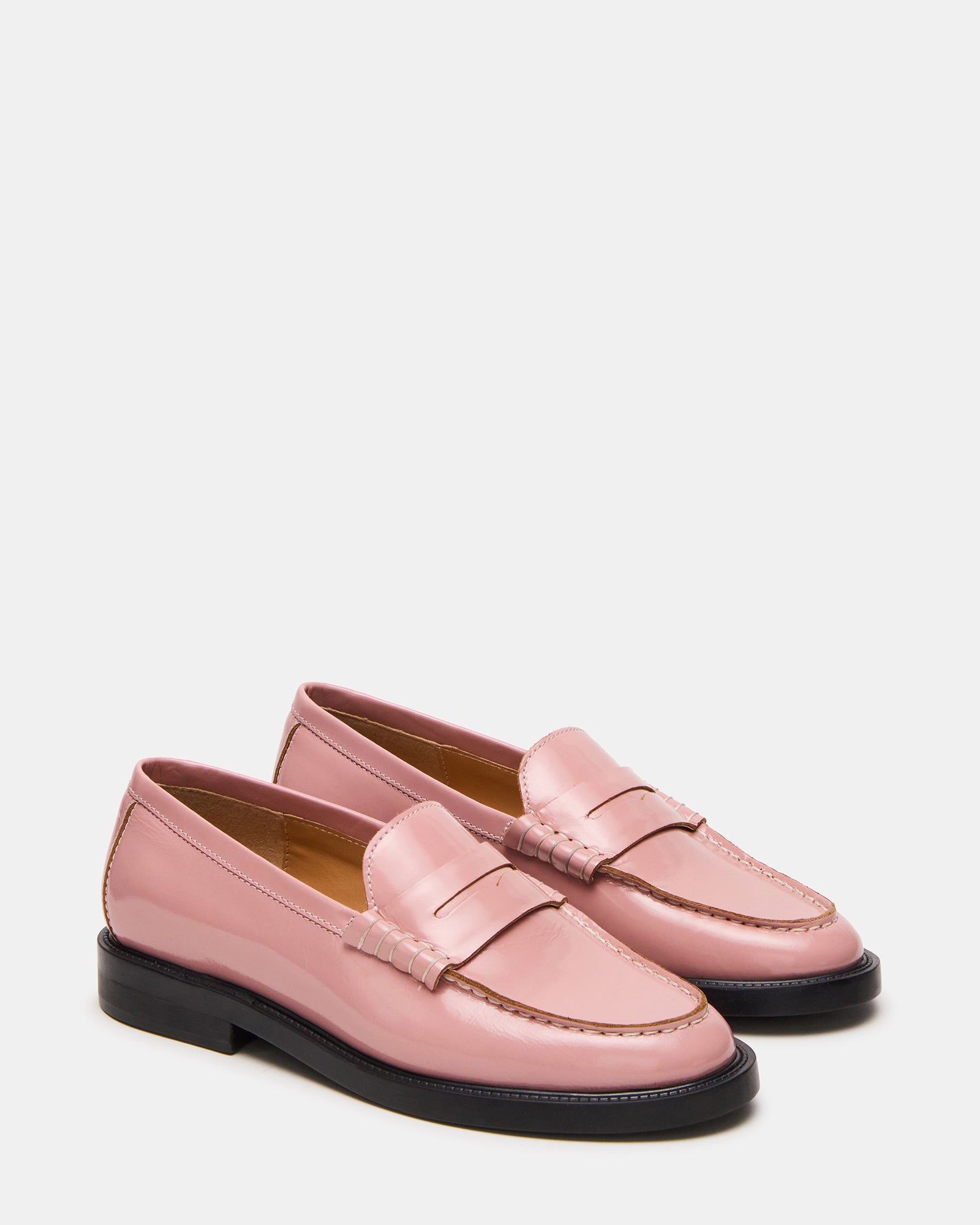 Mens dress shoes featuring Madison light pink loafers styled with business attire