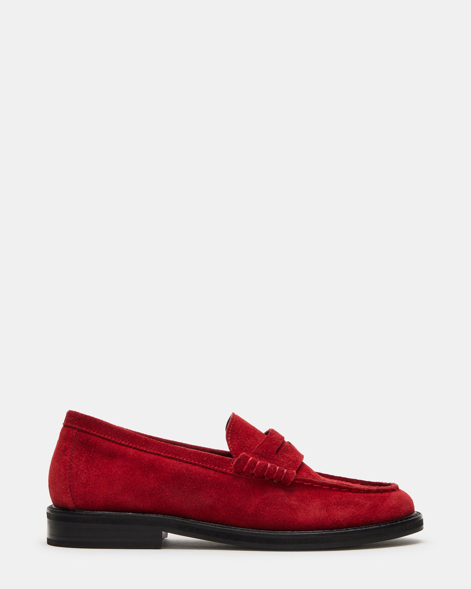 Madison red suede loafers paired with tailored trousers for business casual look