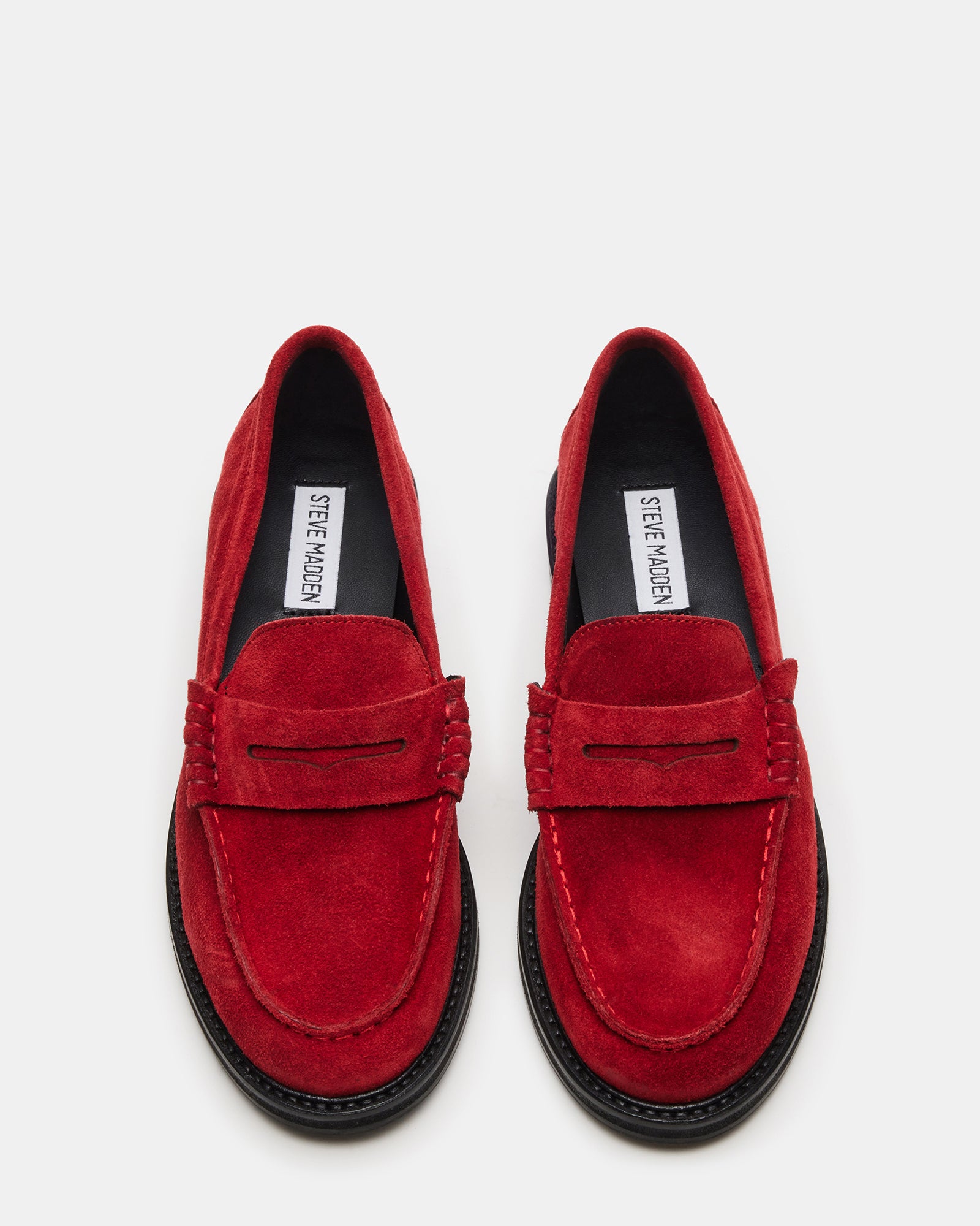 Madison red suede loafers paired with tailored trousers for business casual look