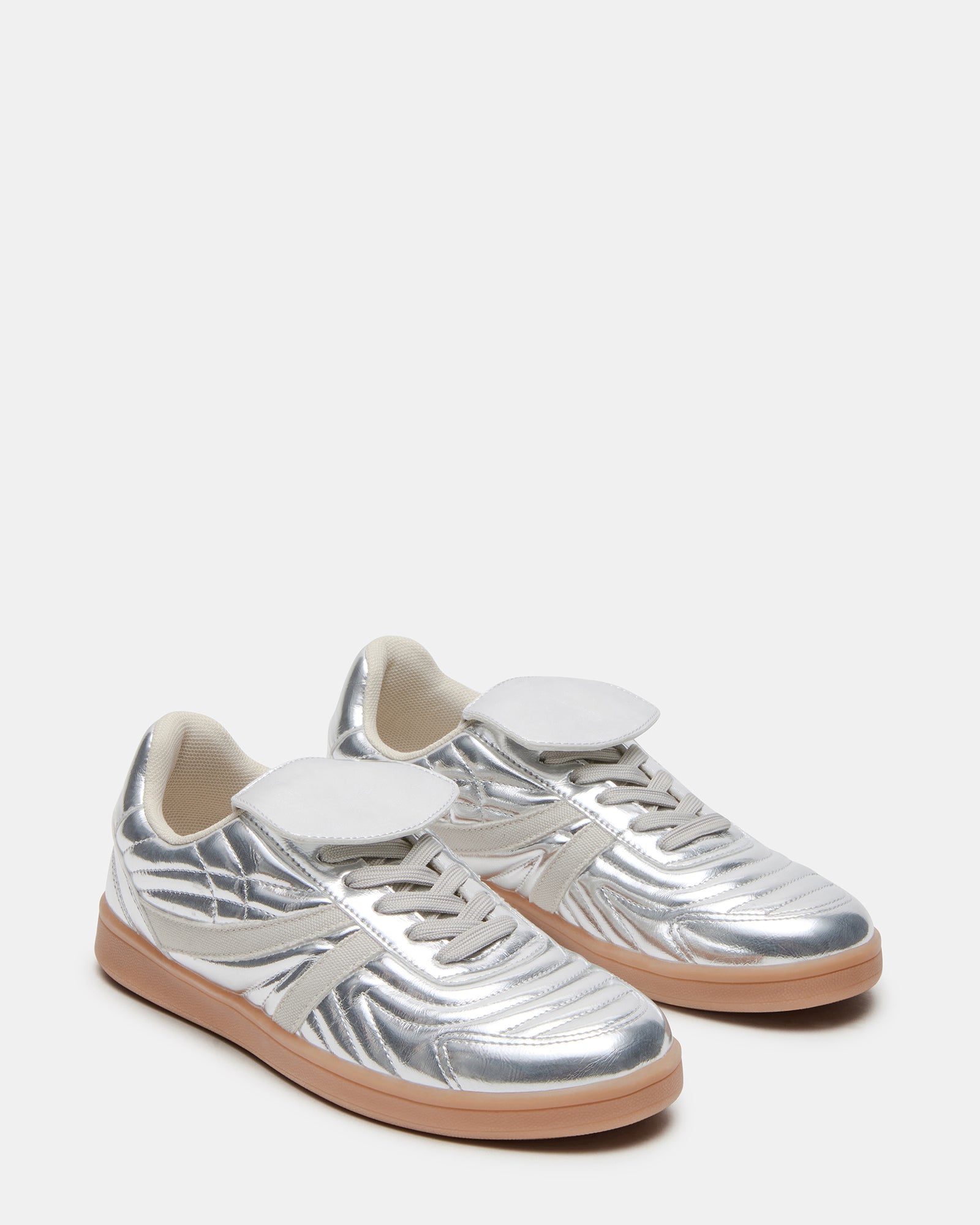Stylish sneakers paired with summer attire