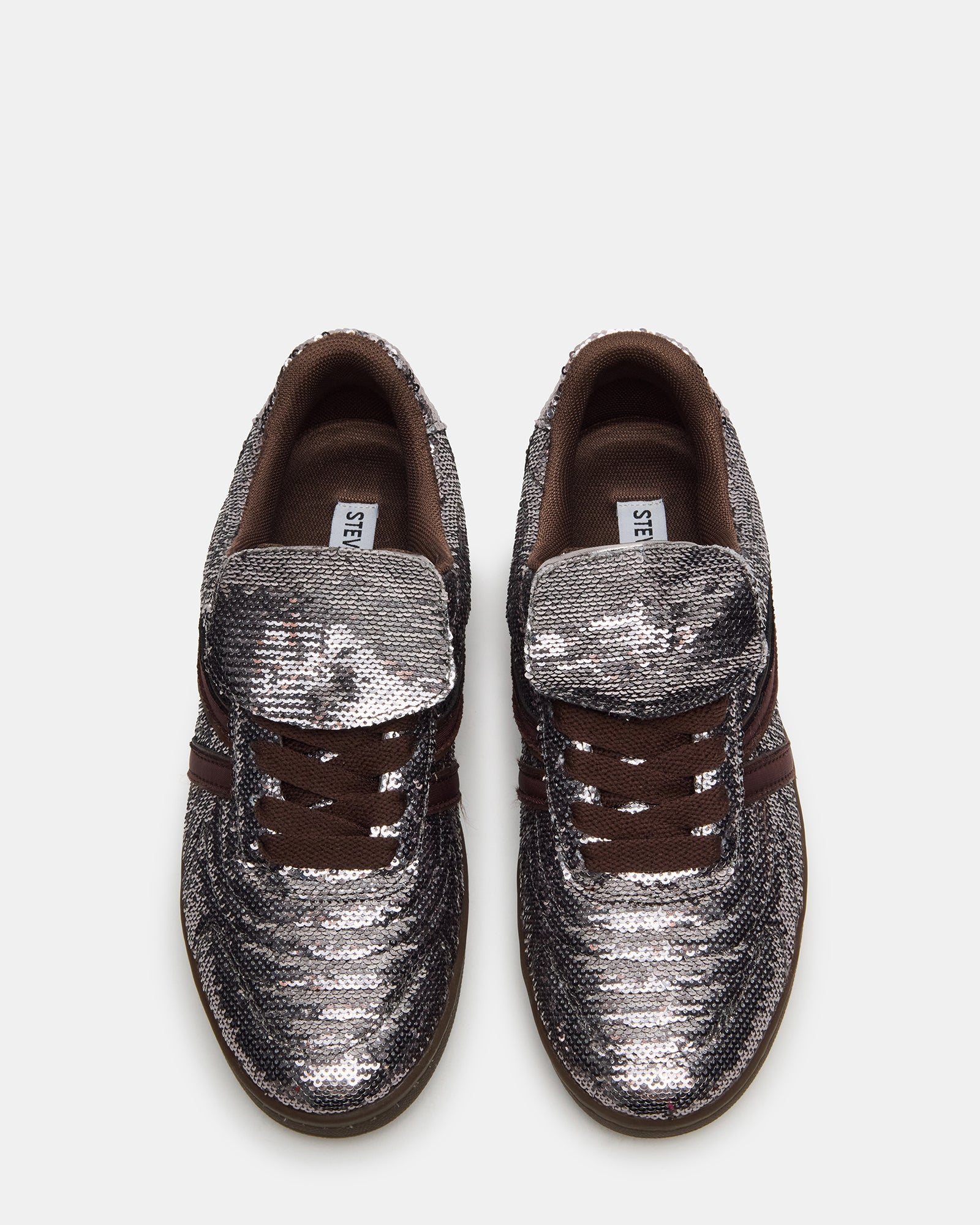 Model wearing Madrid Sequin Pewter low-top shoes with casual outfit
