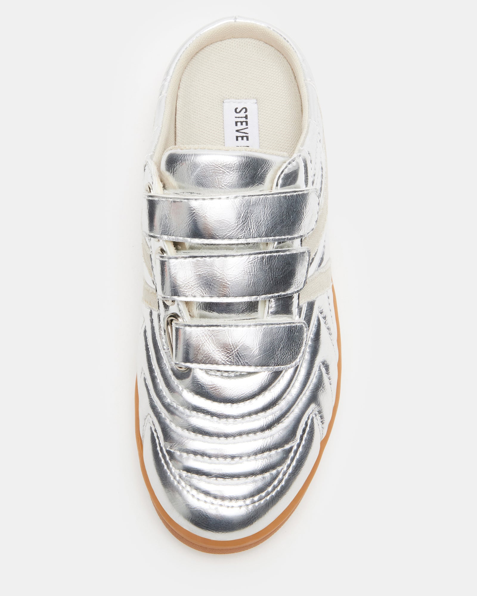 Side view of Magik Silver slip-on sneakers showcasing Velcro straps.