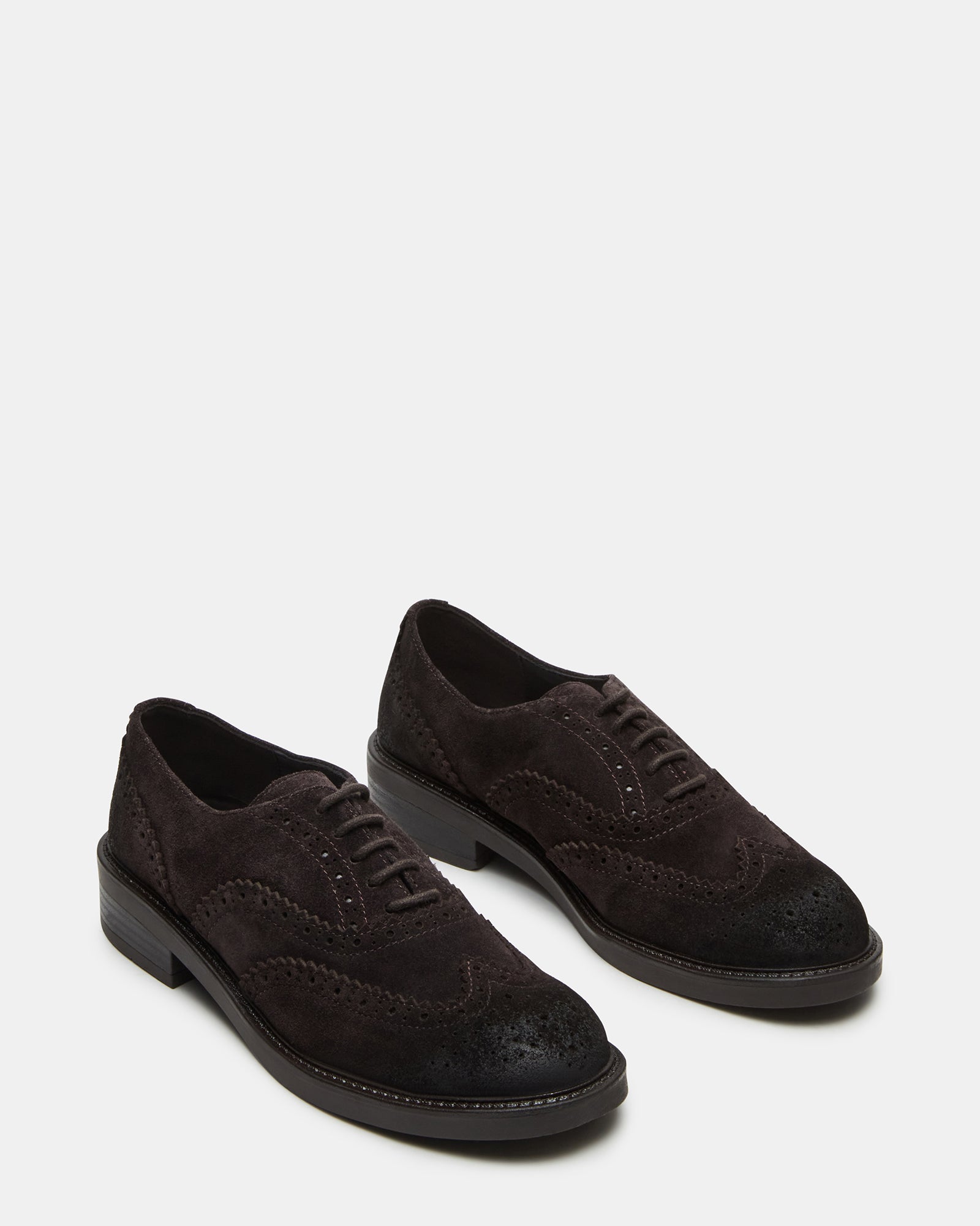 Side profile of mens loafers highlighting the 1.25-inch heel and clean stitching