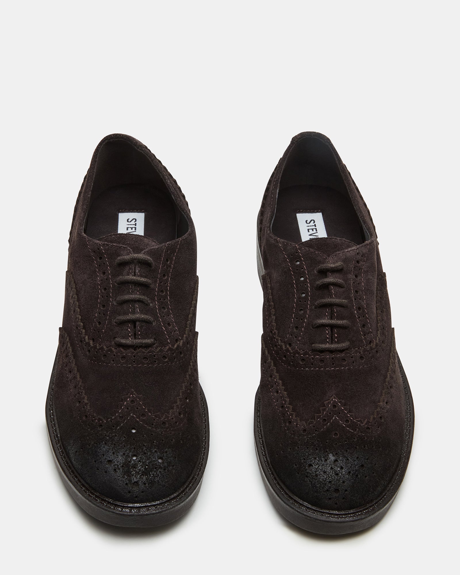 Front view of Malin penny loafers showing suede texture and burnished toe detail