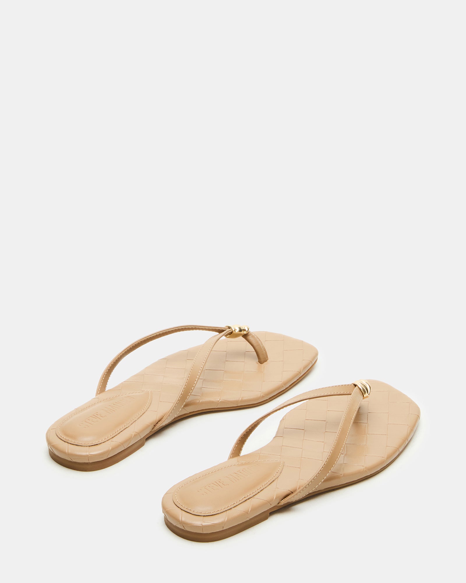 Close-up of the heel and sole of the leather sandals