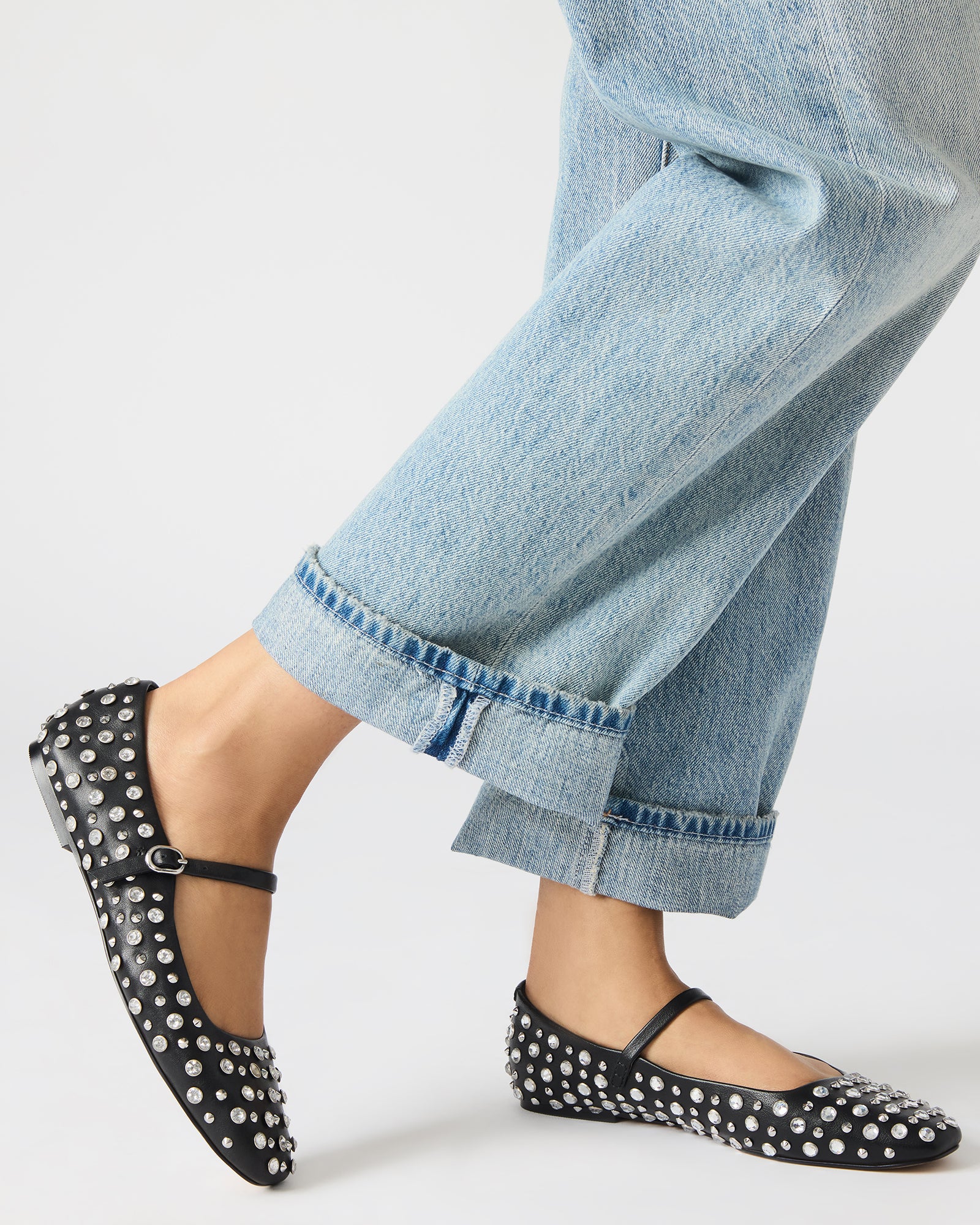 Close-up of the vegan leather upper with rhinestones.