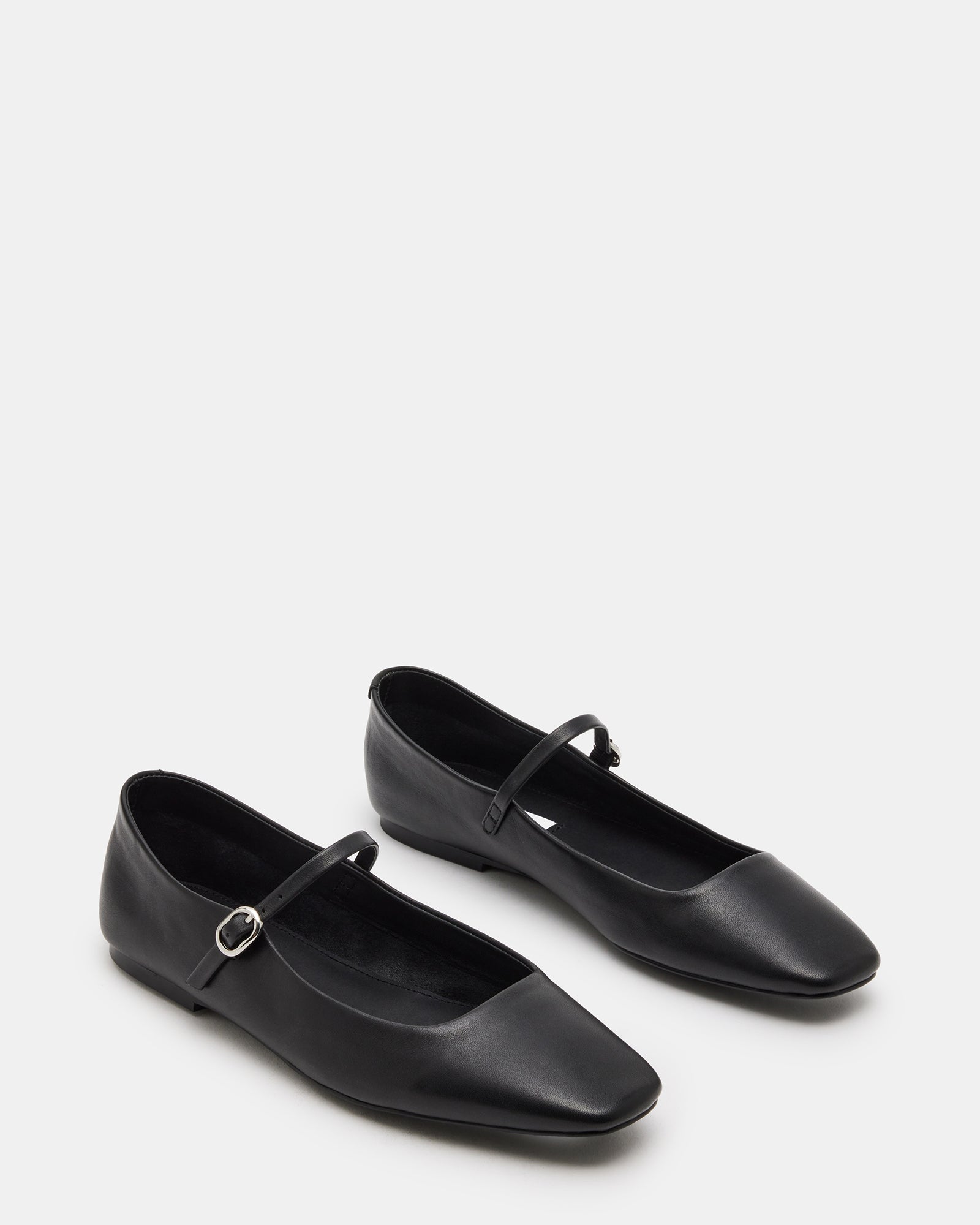 Close-up of Maple leather flats highlighting quality craftsmanship